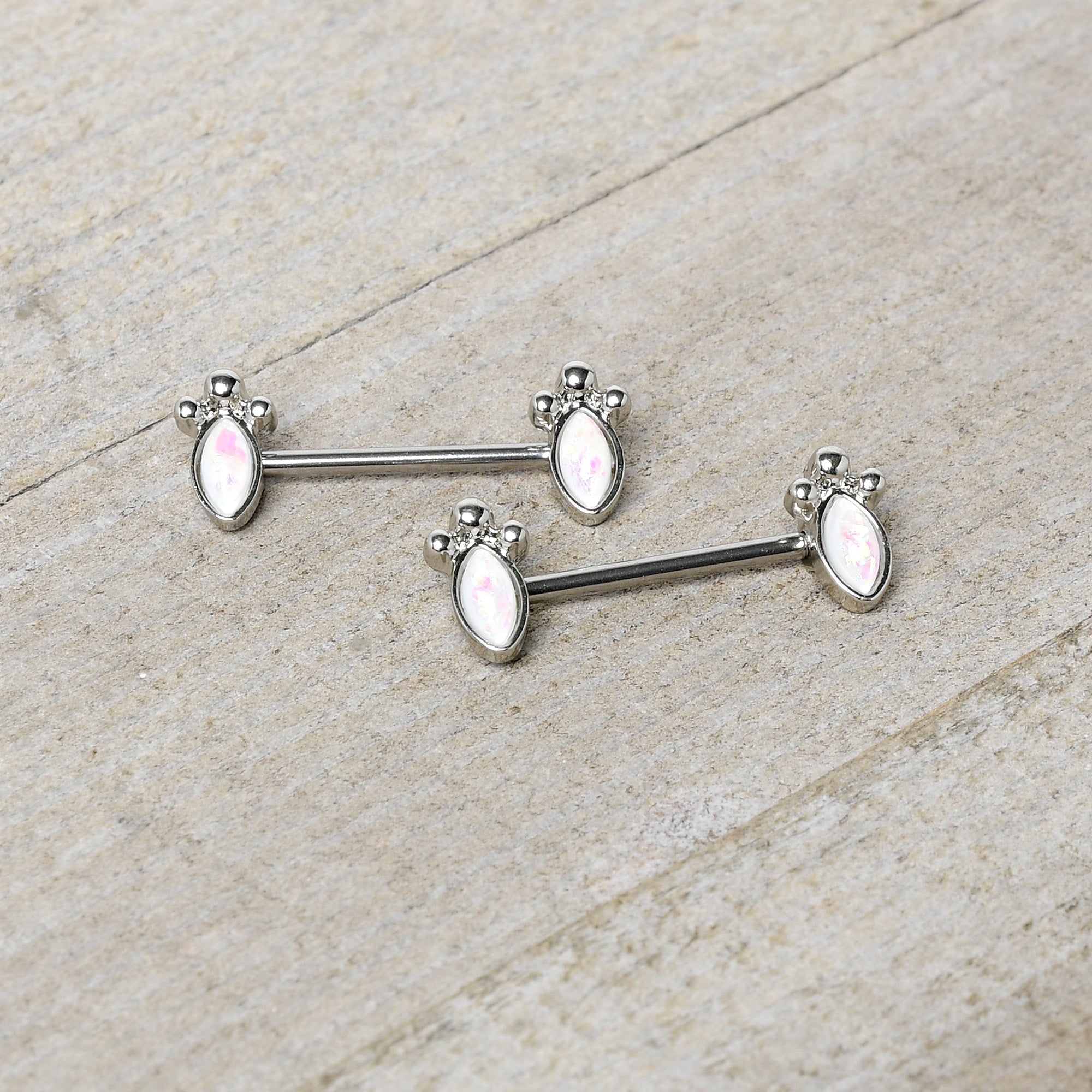 BodyCandy 14G 9/16 White Faux Opal Deco Ovals Barbell Nipple Ring Set — side view