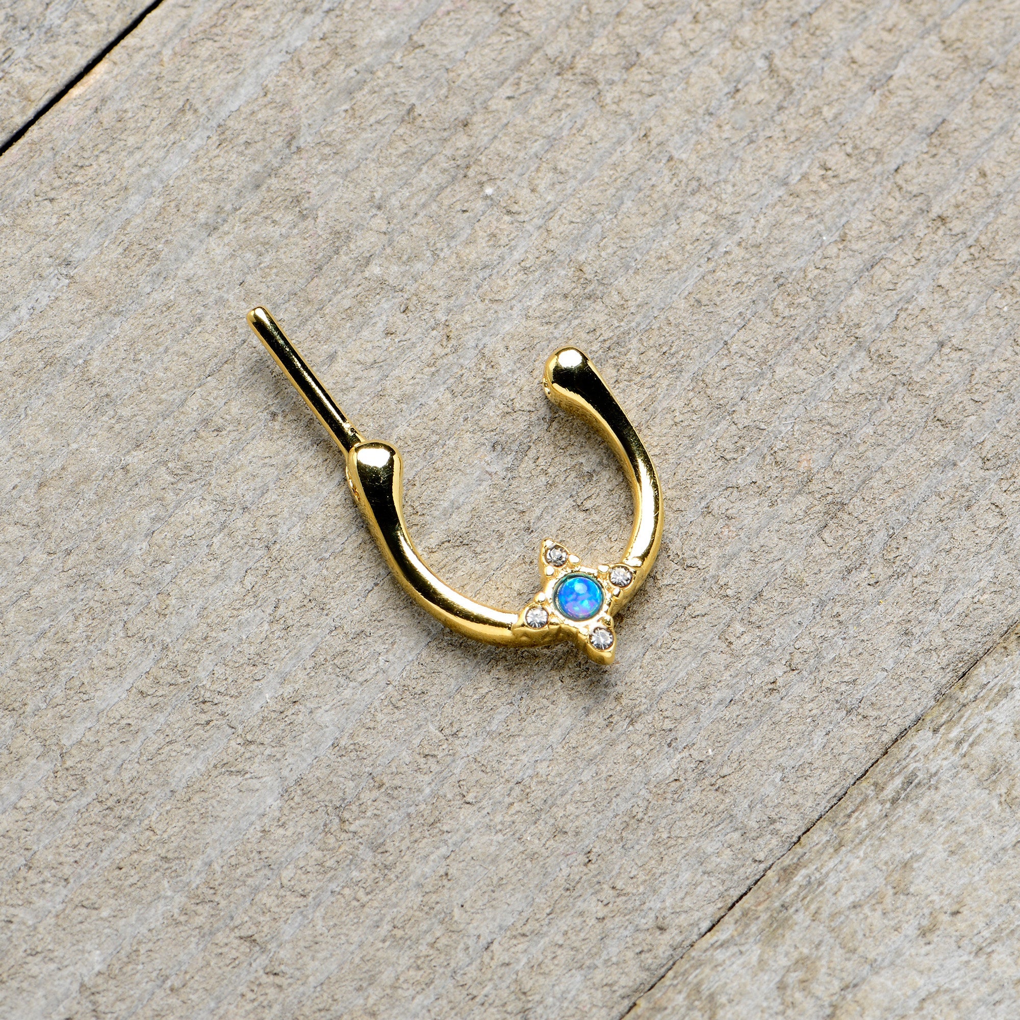 BodyCandy 16G 5/16 Blue Synthetic Opal Gold Tone Rhombus Cartilage Clicker — in-use photo