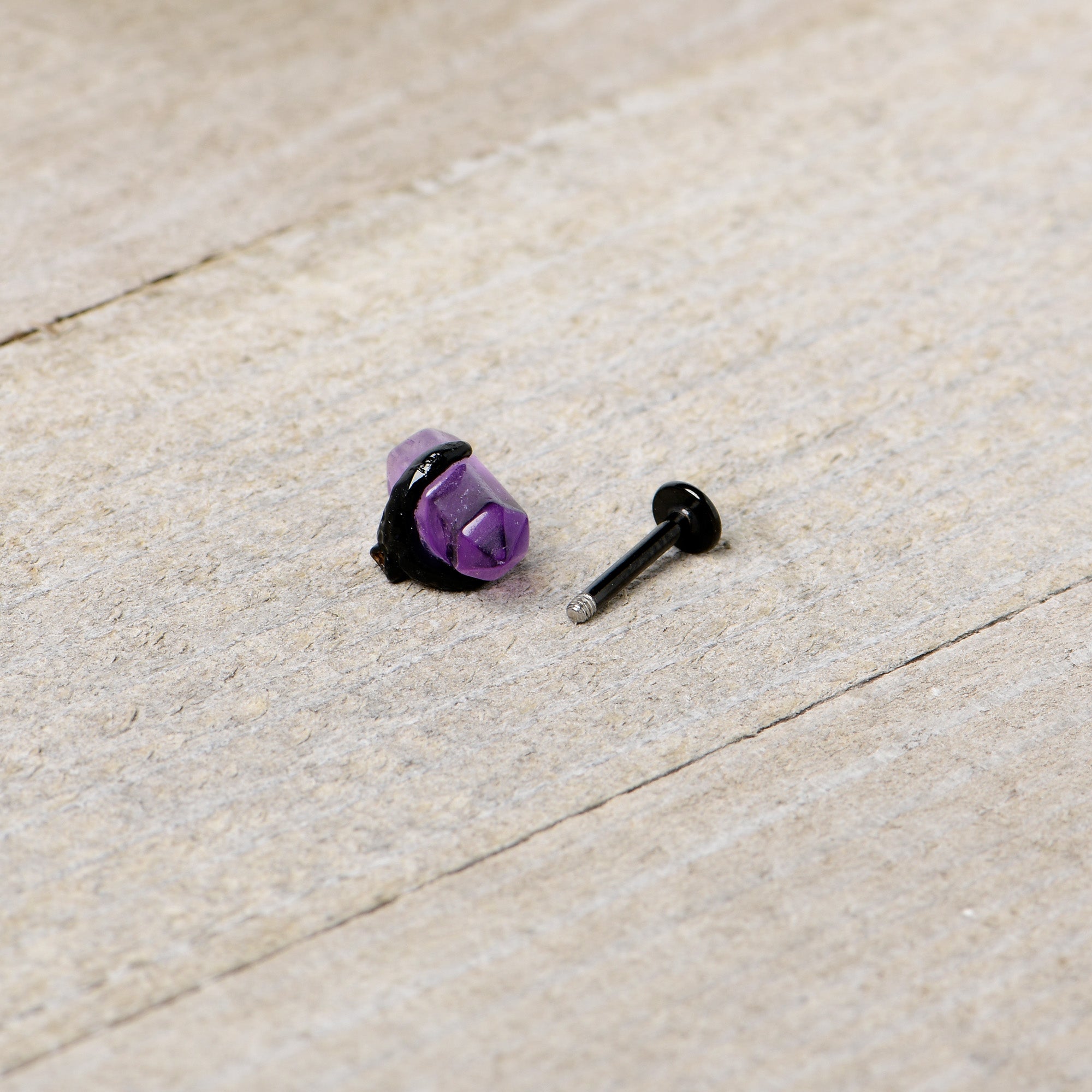 BodyCandy 16G 5/16 Purple Amethyst Black Claw Obelisk Labret Monroe Tragus — in-use photo