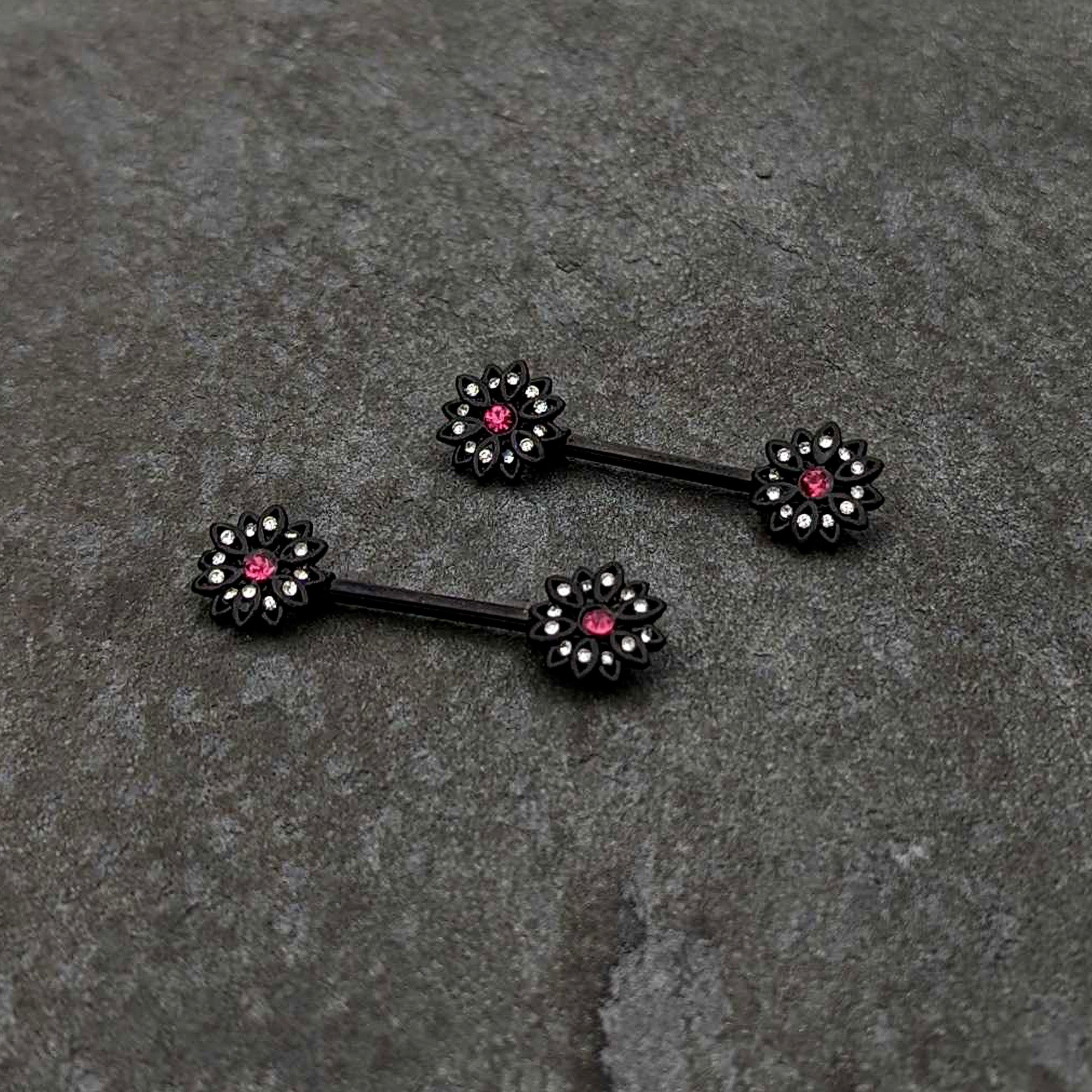 BodyCandy 14G 9/16 Clear Gem Black Midnight Flower Barbell Nipple Ring Set — side view