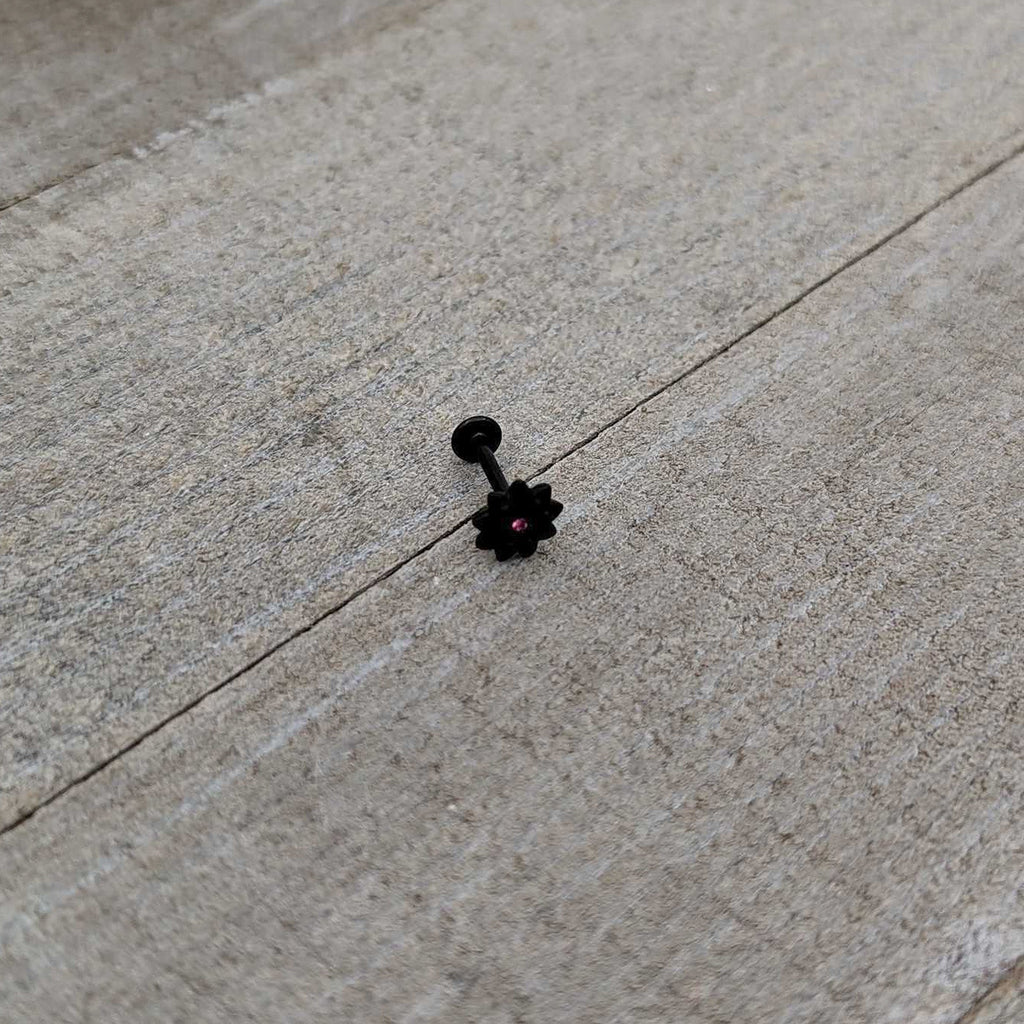 BodyCandy 16G 5/16 Pink Gem Black Midnight Flower Labret Monroe Tragus — in-use photo