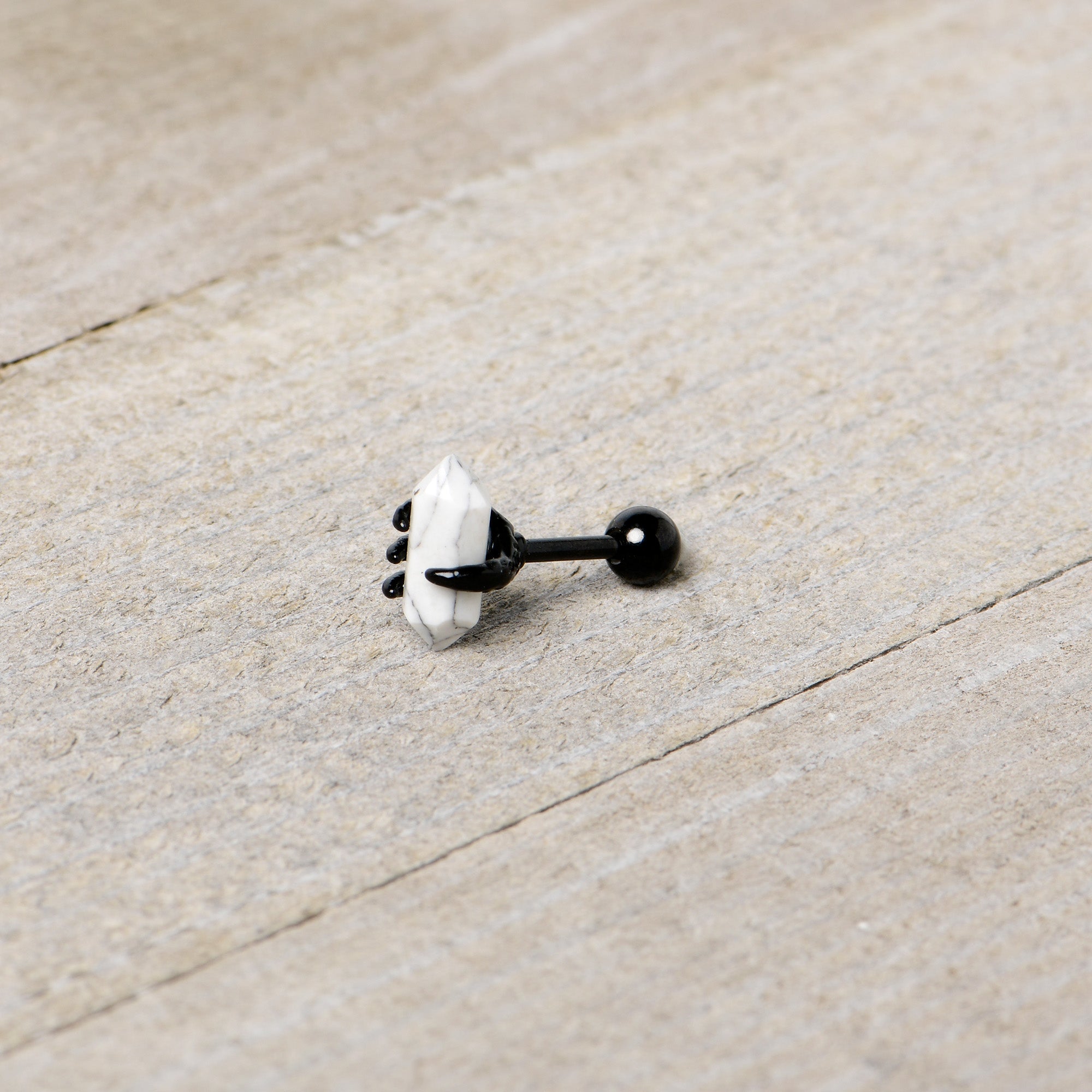 BodyCandy 16G 1/4 White Howlite Black Claw Obelisk Cartilage Earring — in-use photo