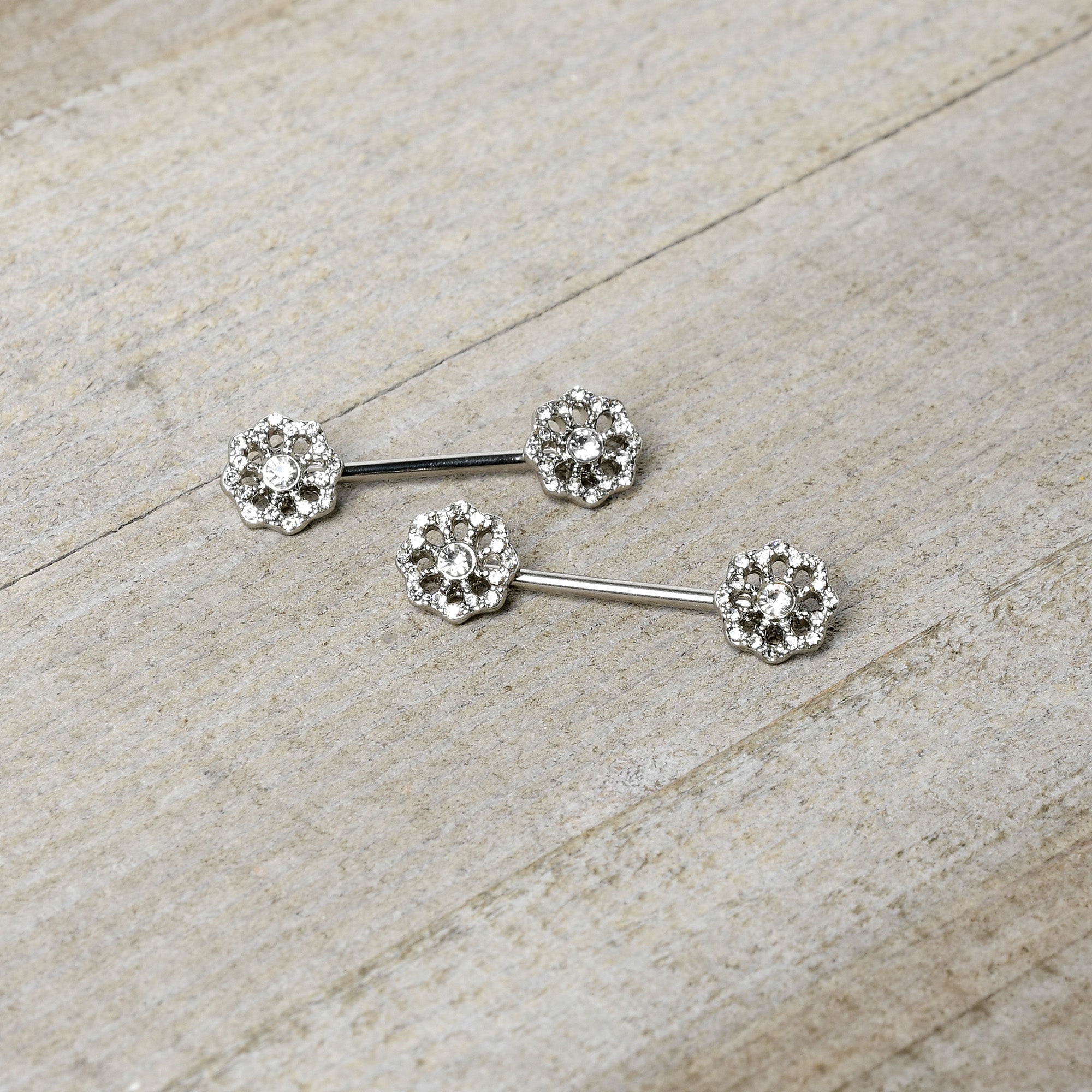 BodyCandy 14G 9/16 Clear Gem Epic Fabulous Flower Barbell Nipple Ring Set — side view