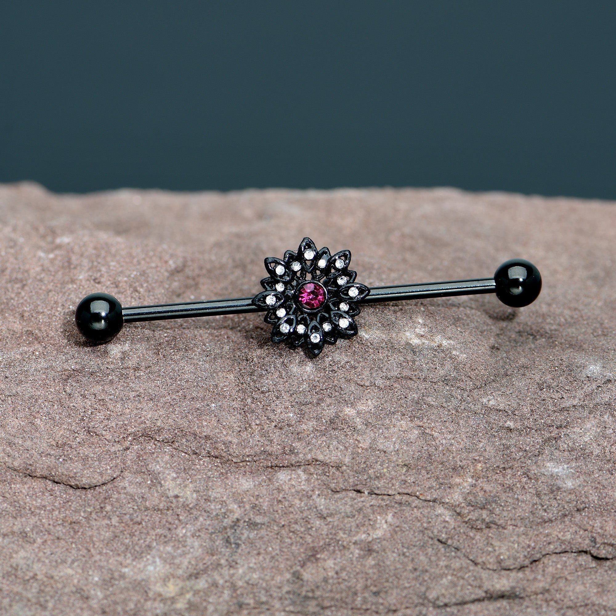 BodyCandy 14G Clear Pink Gem Black Midnight Flower Industrial Barbell 38mm — in-use photo