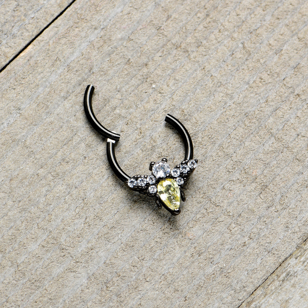 BodyCandy 16G 3/8 Yellow Clear Gem Black Butterfly Hinged Segment Ring — in-use photo