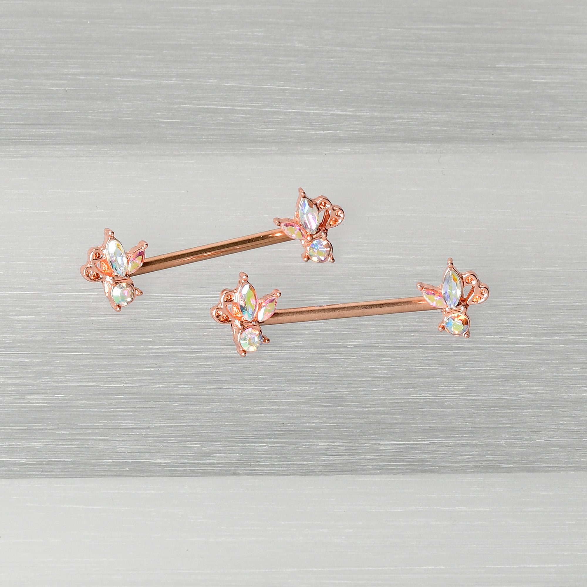 BodyCandy 14G 5/8 Aurora CZ Gem Rosy Hue Fleur de Lis Butterfly Barbell Nipple Ring Set — back view