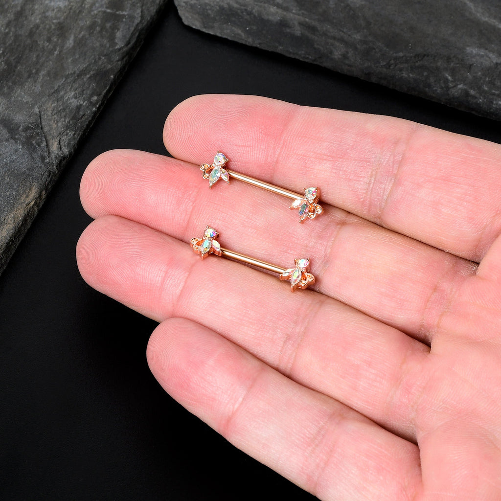 BodyCandy 14G 5/8 Aurora CZ Gem Rosy Hue Fleur de Lis Butterfly Barbell Nipple Ring Set — in-use photo