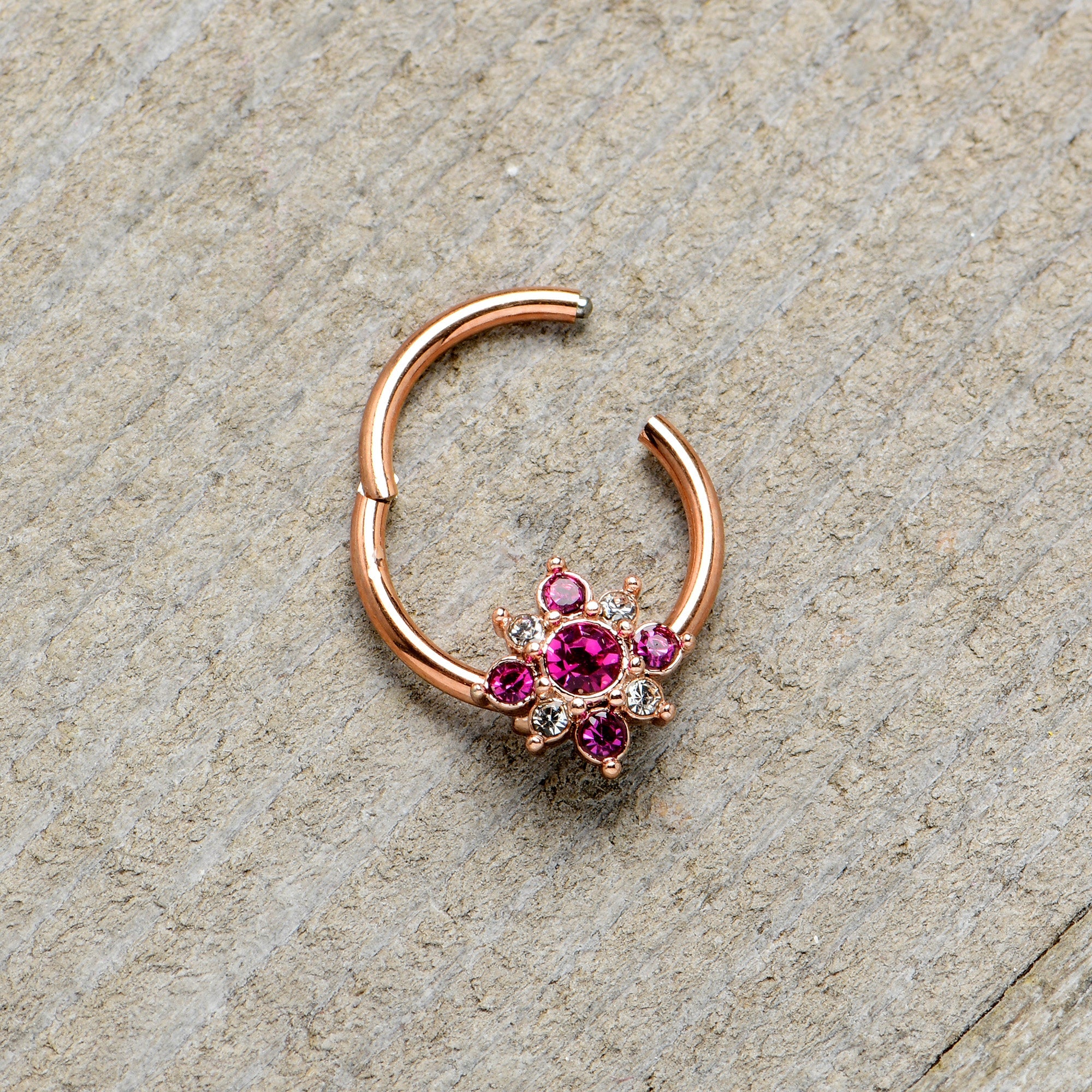 BodyCandy 16G 3/8 Pink Gem Rose Gold Tone Glamour Star Hinged Segment Ring — in-use photo