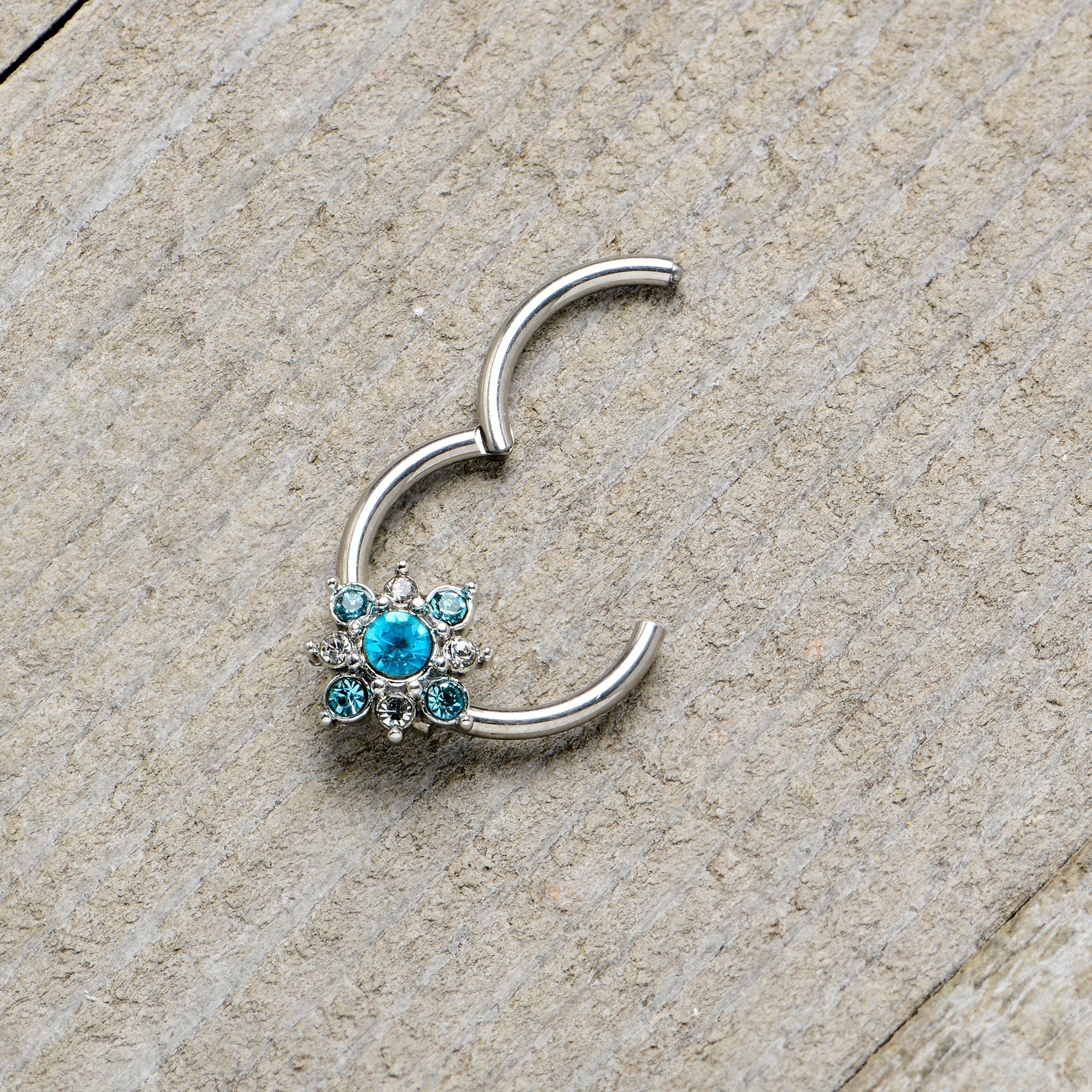 BodyCandy 16G 3/8 Blue Clear Gem Glamour Star Hinged Segment Ring — in-use photo