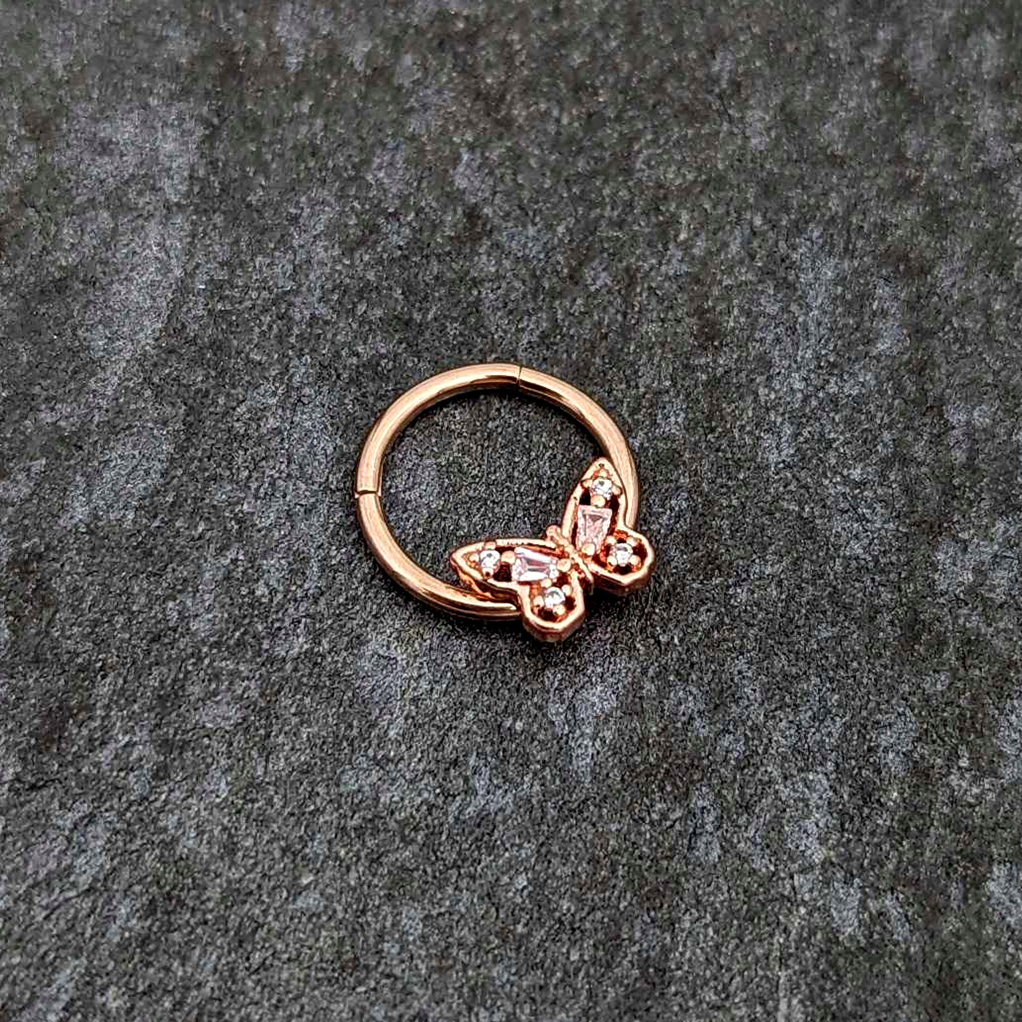 BodyCandy 16G 3/8 Clear Gem Rosy Tone Baroque Butterfly Hinged Segment Ring — side view