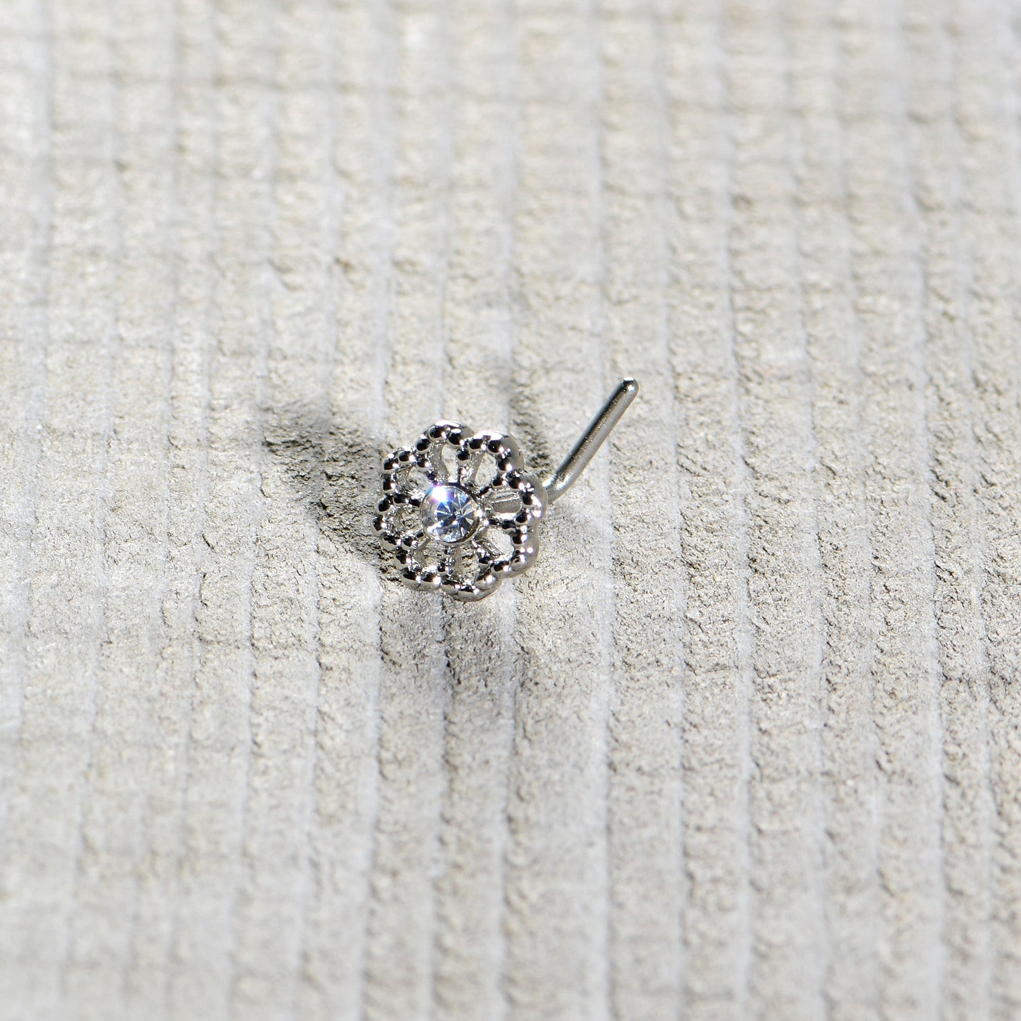 BodyCandy 20G 7mm Clear Gem Epic Fabulous Flower L Shape Nose Ring — in-use photo