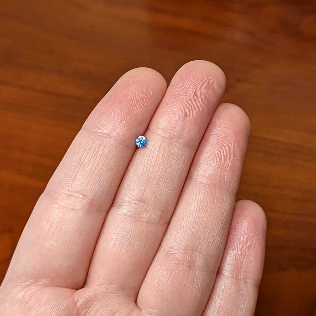 BodyCandy 16G 5/16 Blue CZ ASTM F-136 Implant Grade Titanium Threadless Heart End Labret — in-use photo
