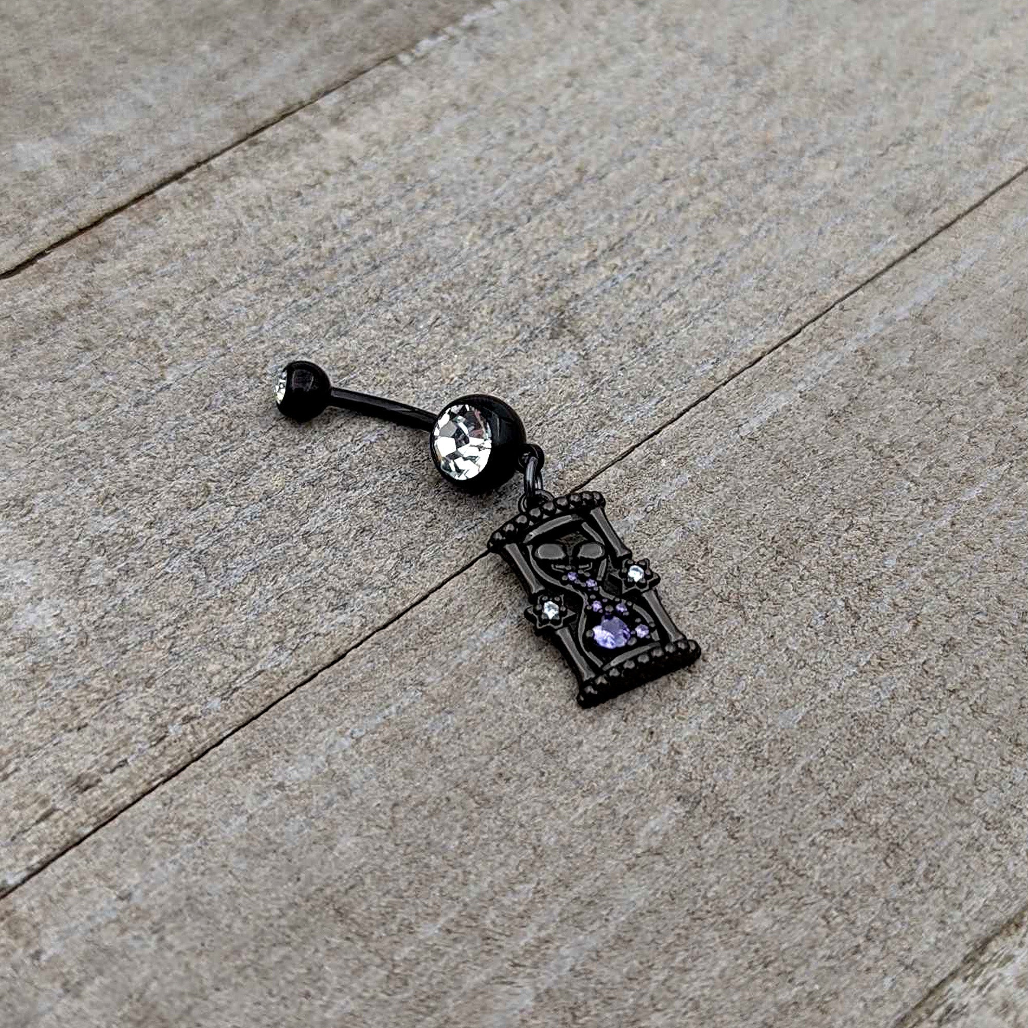 BodyCandy Clear Purple Gem Black Goth Heart Skulls Hourglass Dangle Belly Ring — back view