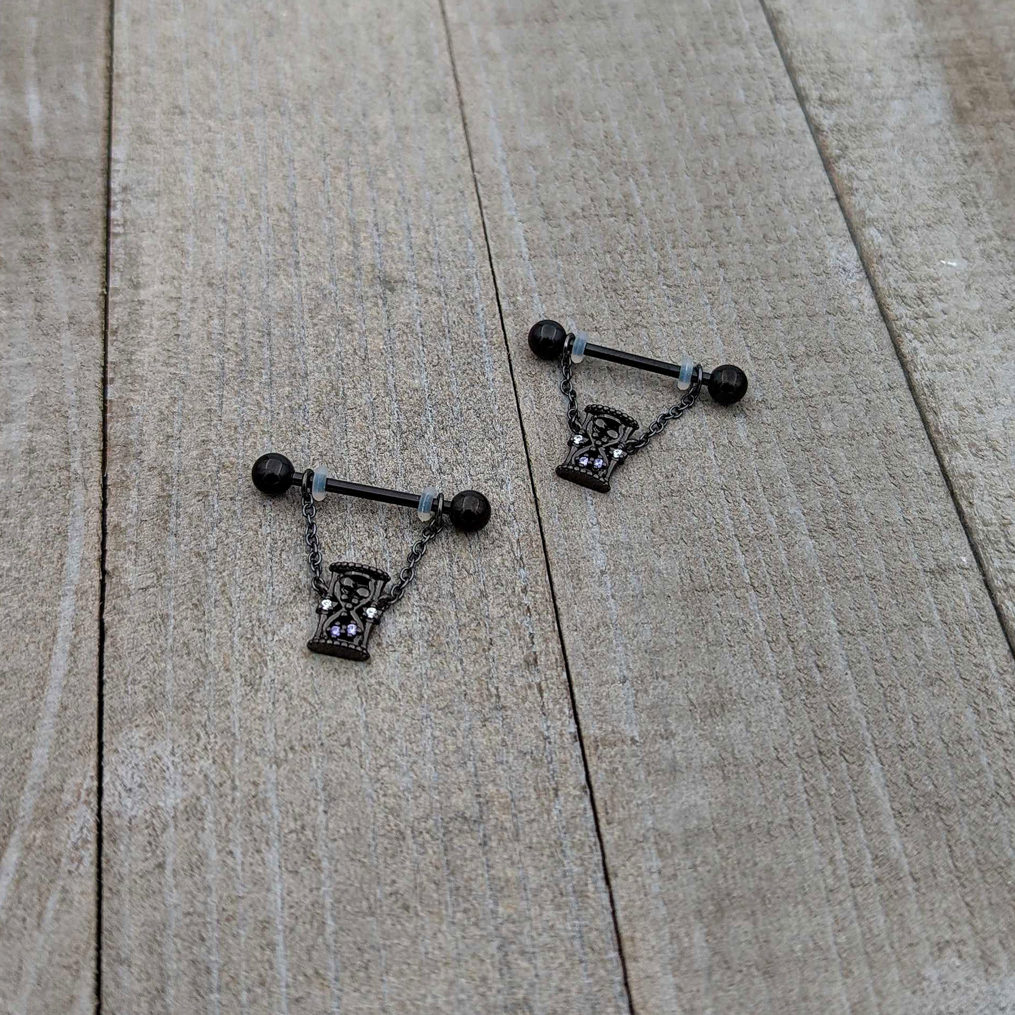 BodyCandy 14G 5/8 Purple Gem Black Goth Hourglass Chain Dangle Nipple Ring Set — in-use photo