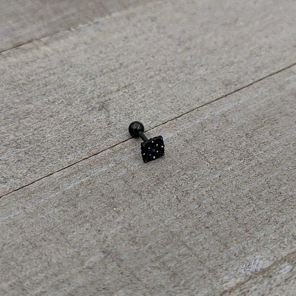 BodyCandy 16G 1/4 Blue Gem Black Lacy Rhombus Cartilage Tragus Earring — in-use photo