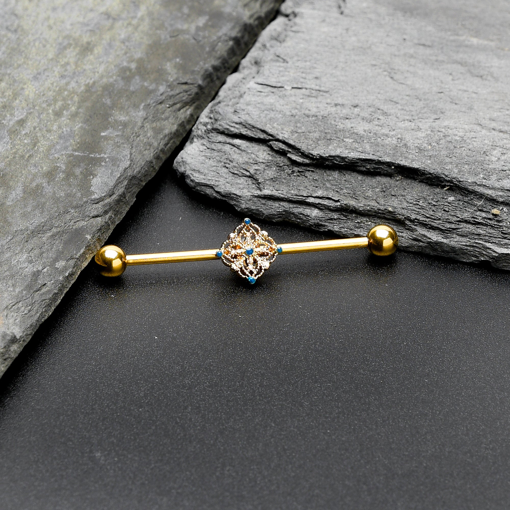 BodyCandy 14G Blue Gem Gold Tone Texture Emblem Industrial Barbell 38mm — side view