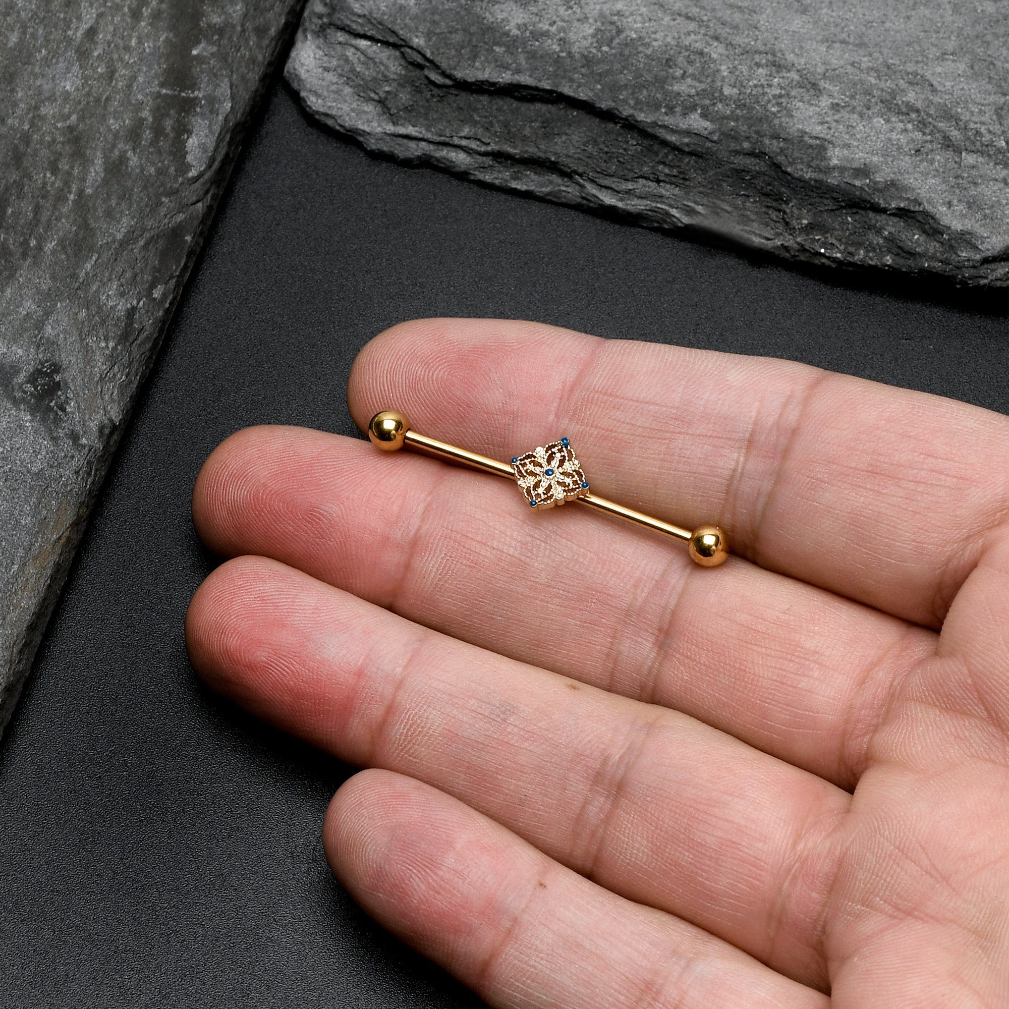 BodyCandy 14G Blue Gem Gold Tone Texture Emblem Industrial Barbell 38mm — size reference
