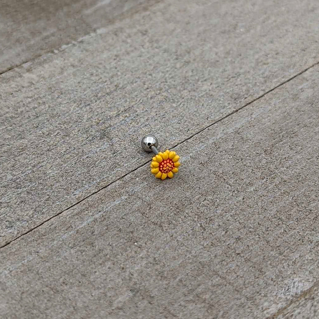 BodyCandy 16G 1/4 Happy Sunflower Cartilage Tragus Earring — in-use photo