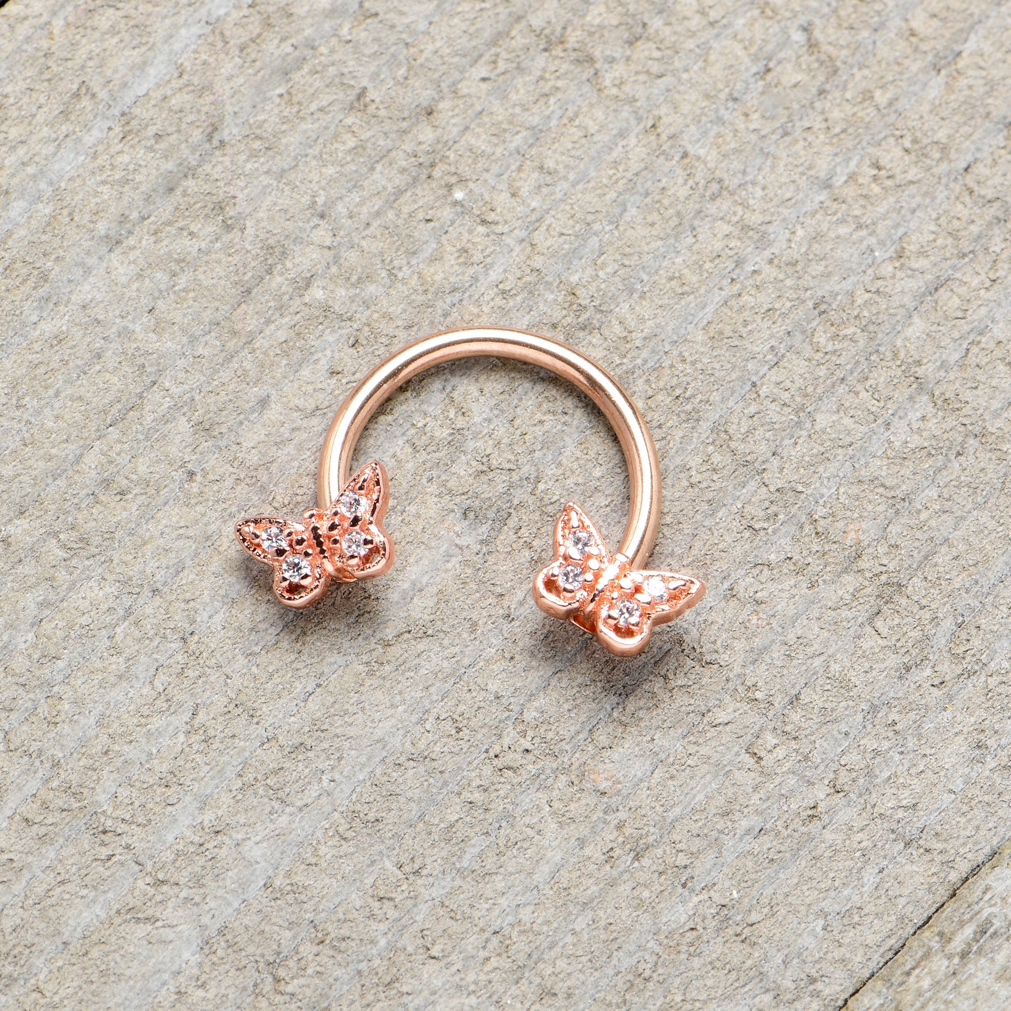 BodyCandy 16G 3/8 Clear Gem Rosy Tone Butterfly Horseshoe Circular Barbell — alternative angle