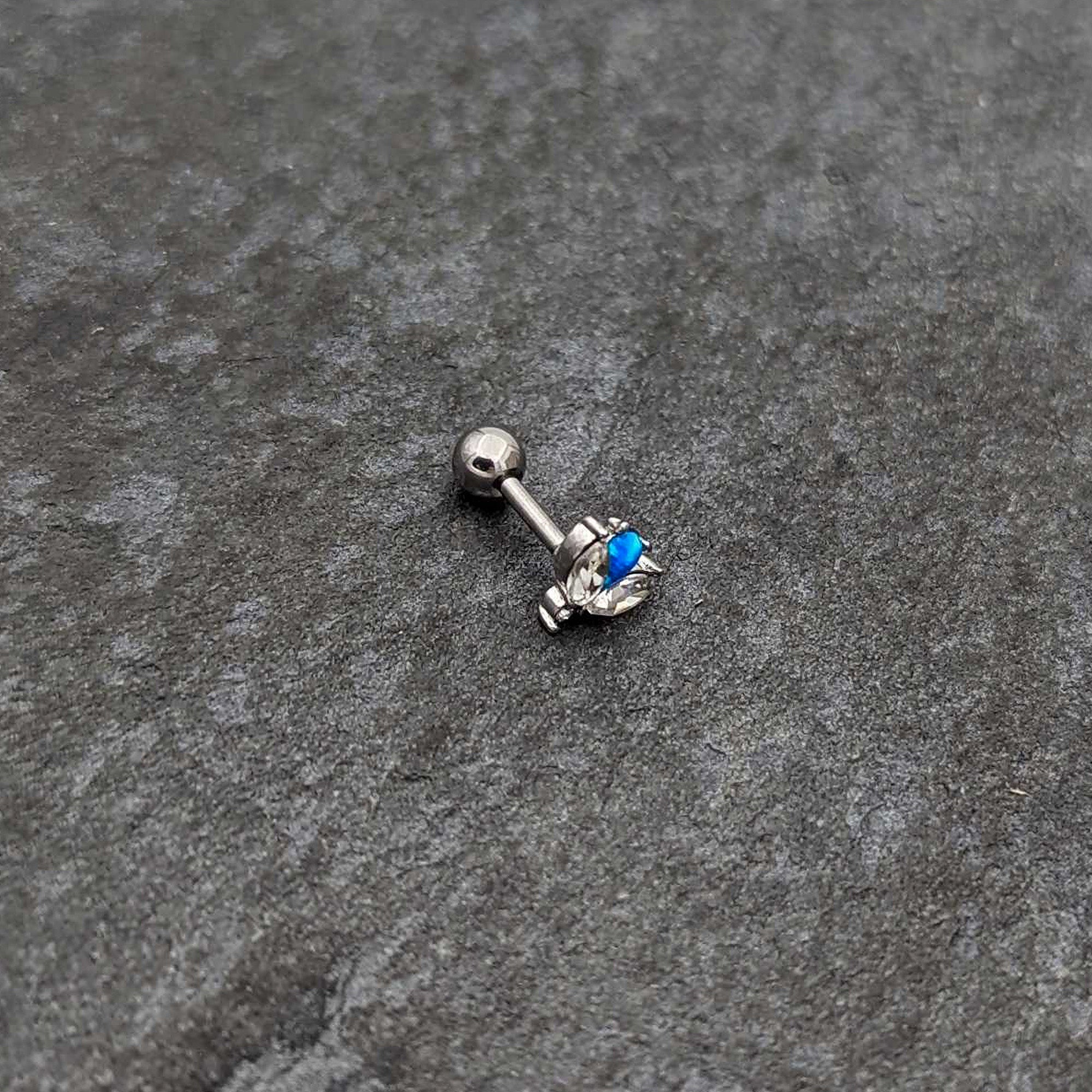 BodyCandy 16G 1/4 Blue Synthetic Opal Style Flower Cartilage Tragus Earring — alternative angle