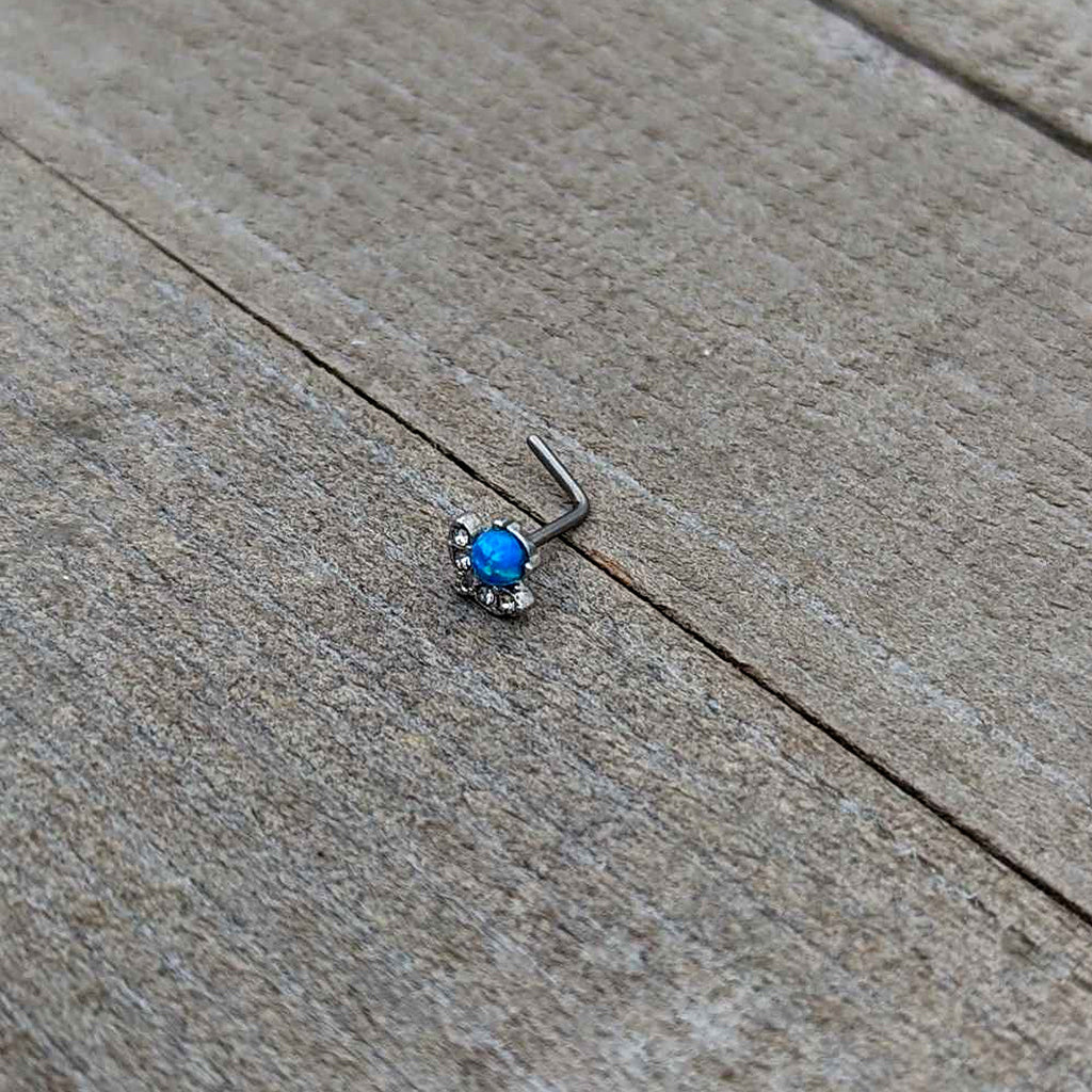 BodyCandy 20G 1/4 Blue Synthetic Opal Style Flower L Shape Nose Ring — in-use photo