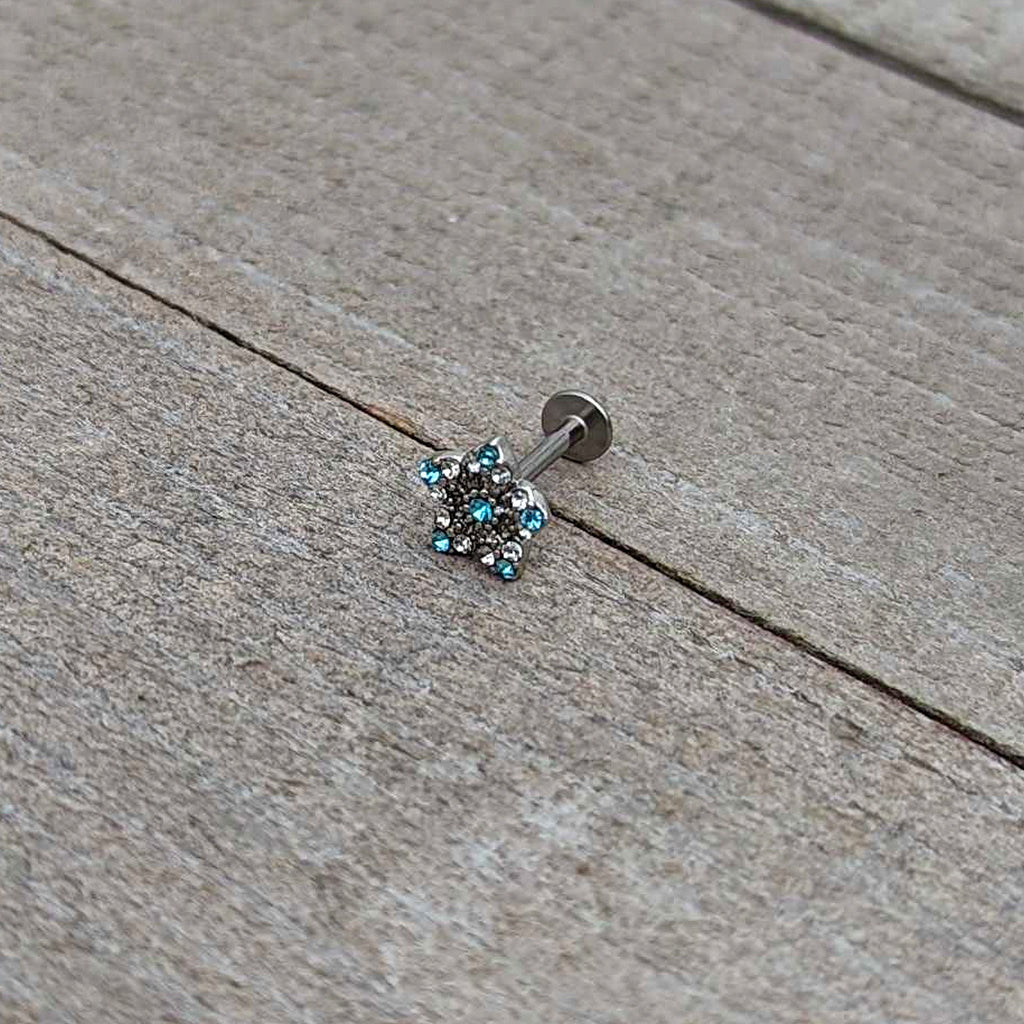 BodyCandy 16G 5/16 Clear Blue Gem Opulent Flower Labret Monroe Tragus — in-use photo