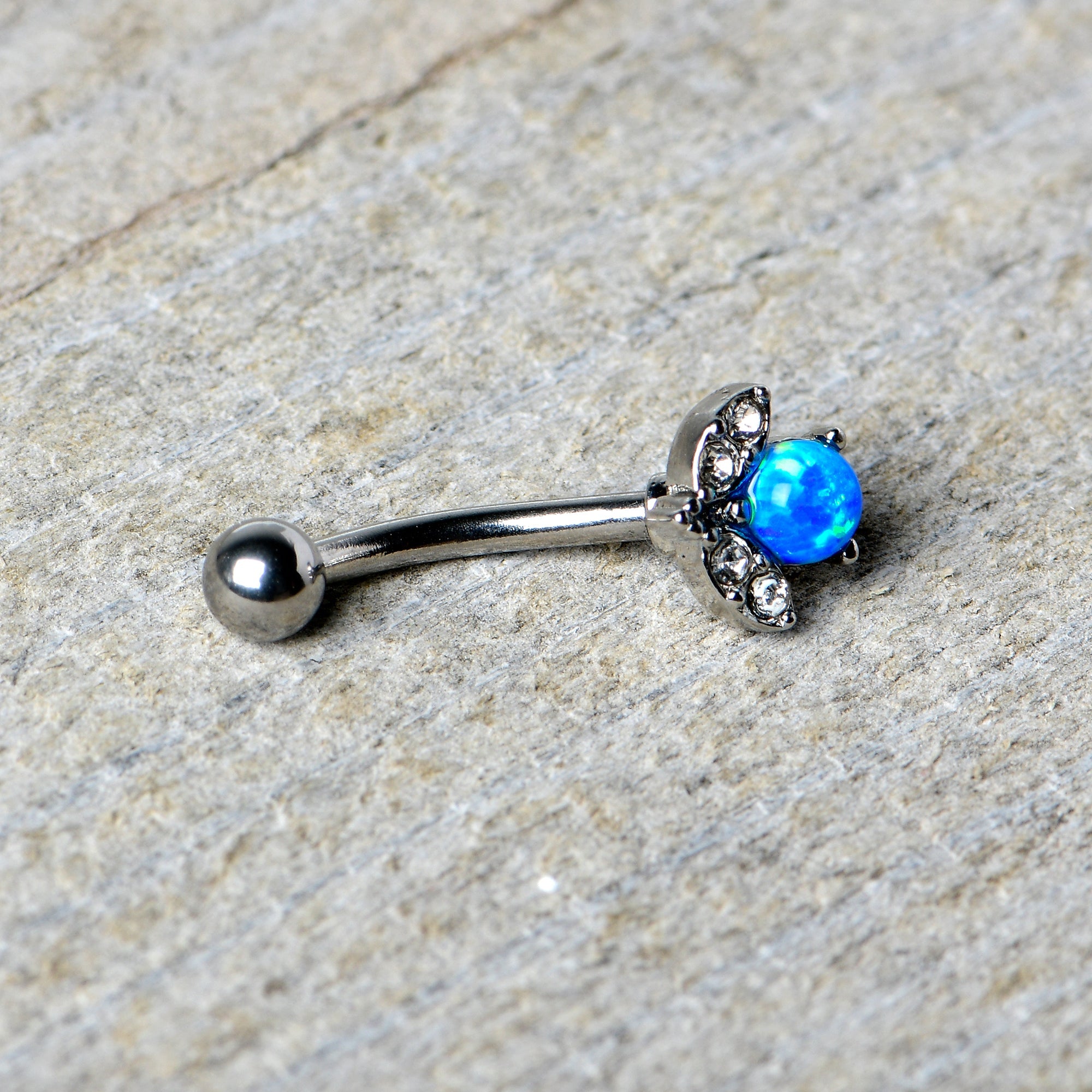 BodyCandy 16G 5/16 Clear Gem Blue Faux Opal Style Flower Curved Eyebrow Ring — back view