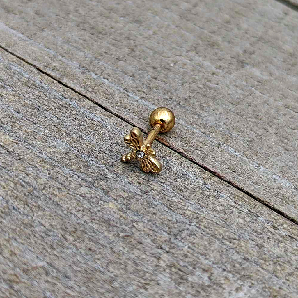 BodyCandy 16G 1/4 Clear Gem Gold Tone Flying Dragonfly Cartilage Earring — in-use photo