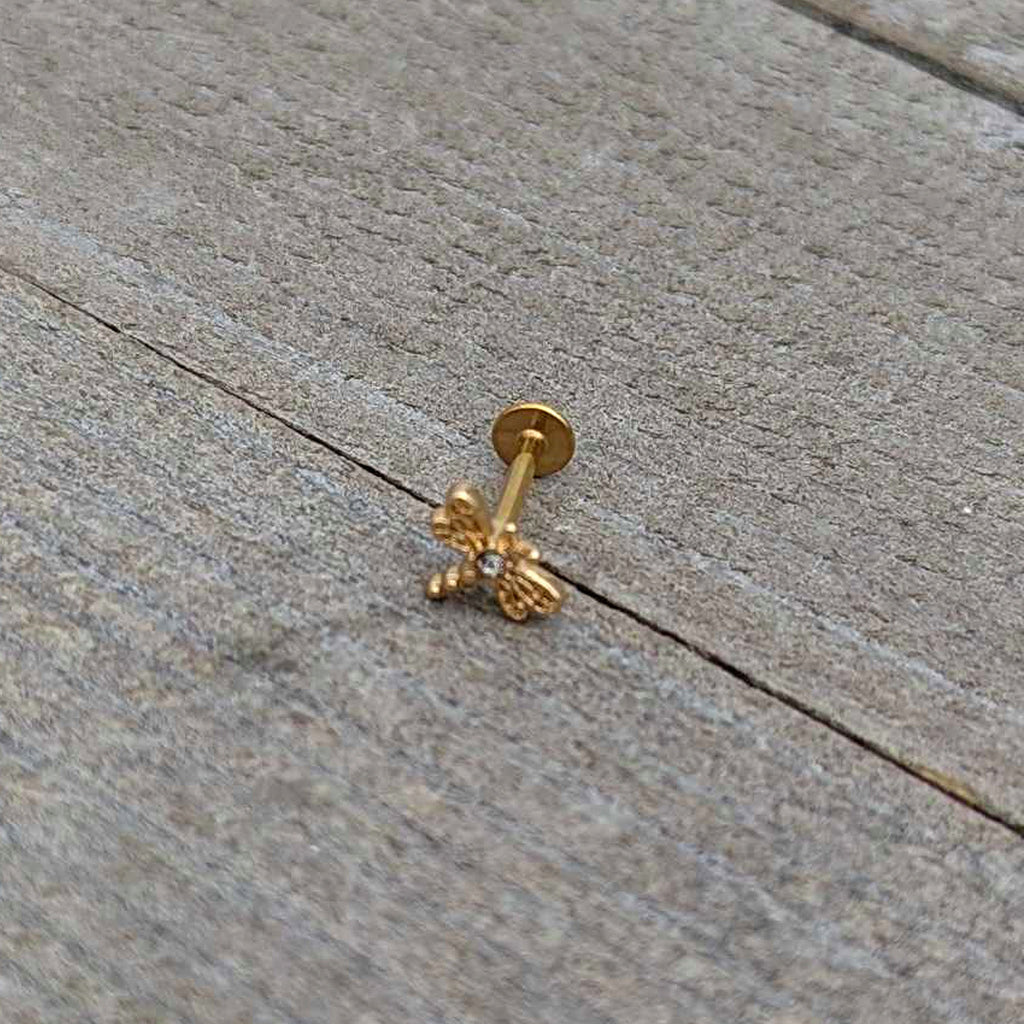 BodyCandy 16G 5/16 Clear Gem Gold Hue Flying Dragonfly Labret Monroe Tragus — in-use photo