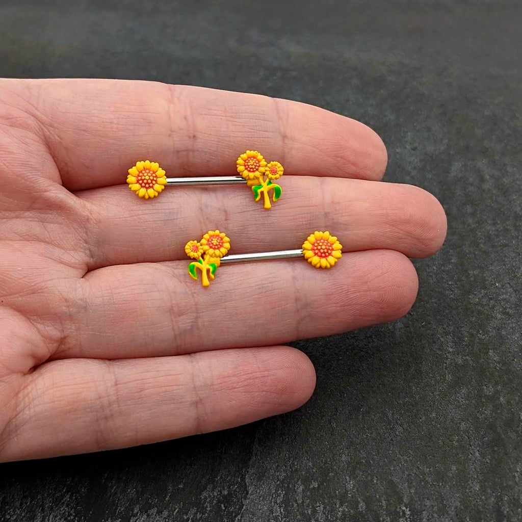 BodyCandy 14G 9/16 Happy Yellow Sunflower Trio Barbell Nipple Ring Set — in-use photo