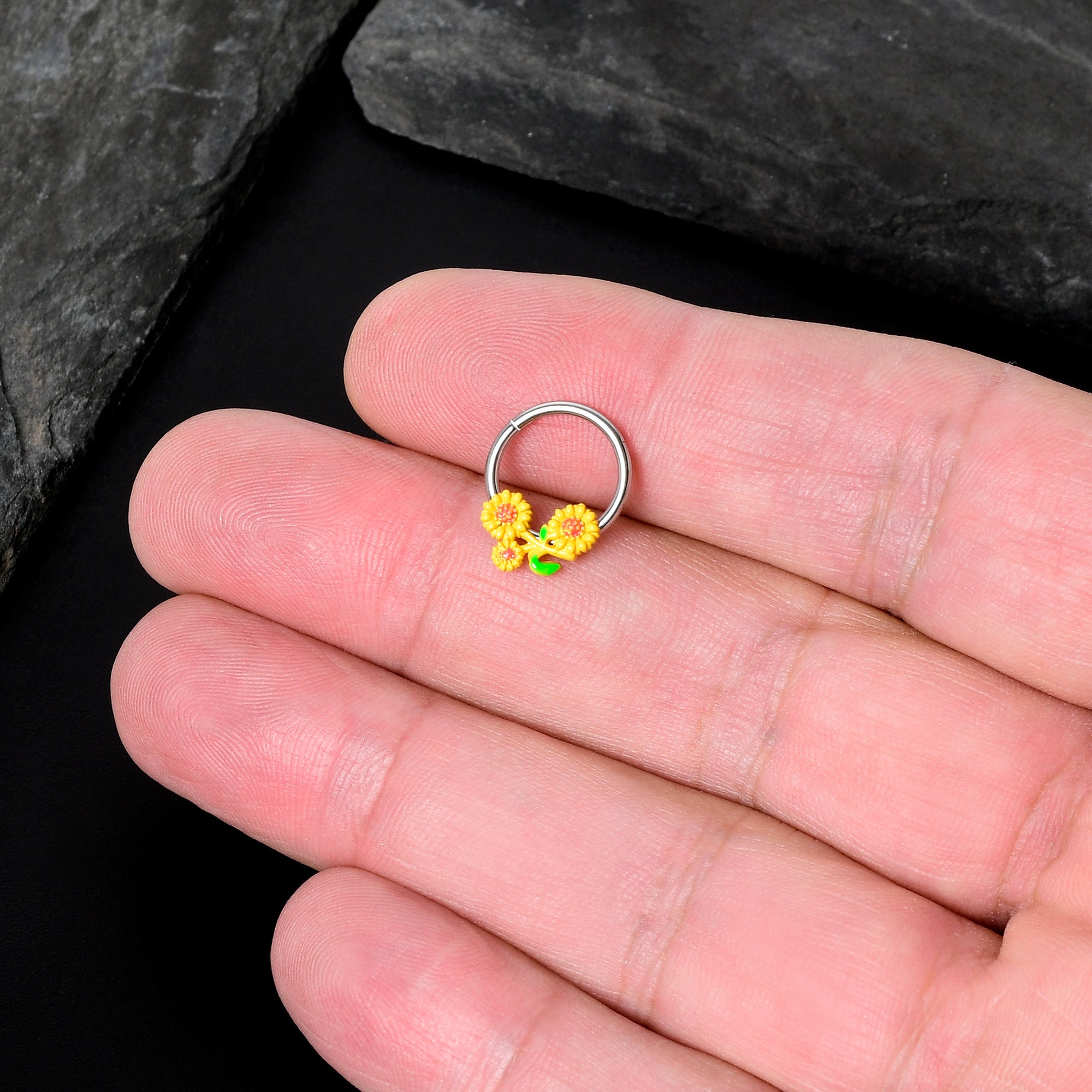 BodyCandy 16G 3/8 Happy Yellow Sunflower Trio Hinged Segment Ring — in-use photo