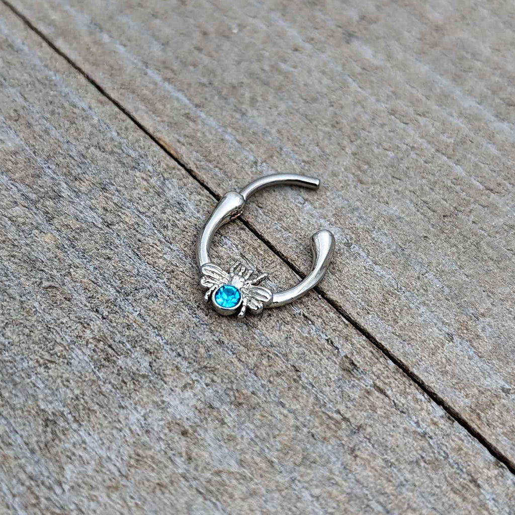BodyCandy 16G 5/16 Blue Gem Ultra Fly Cartilage Clicker — in-use photo