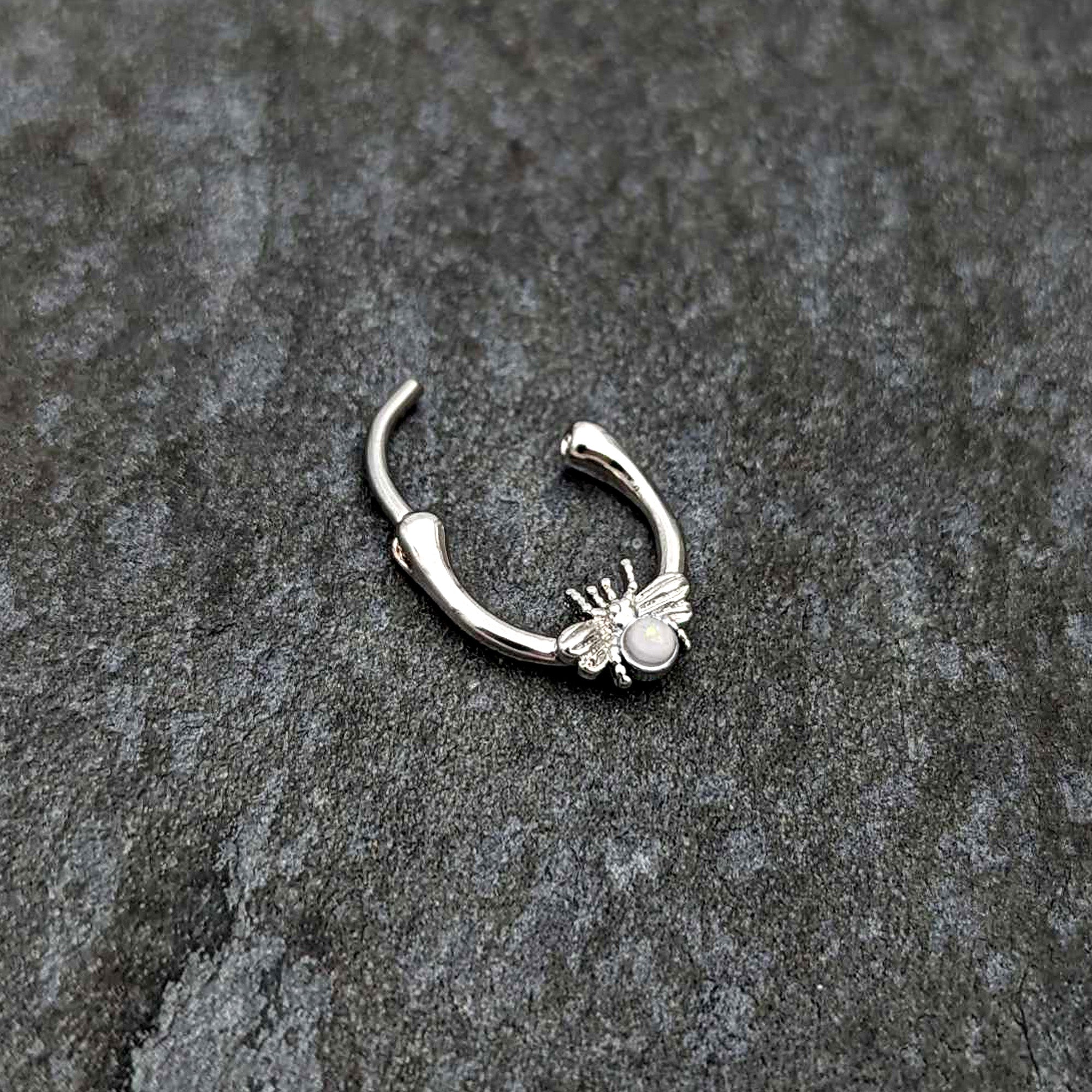 BodyCandy 16G 5/16 White Faux Opal Ultra Fly Cartilage Clicker — back view