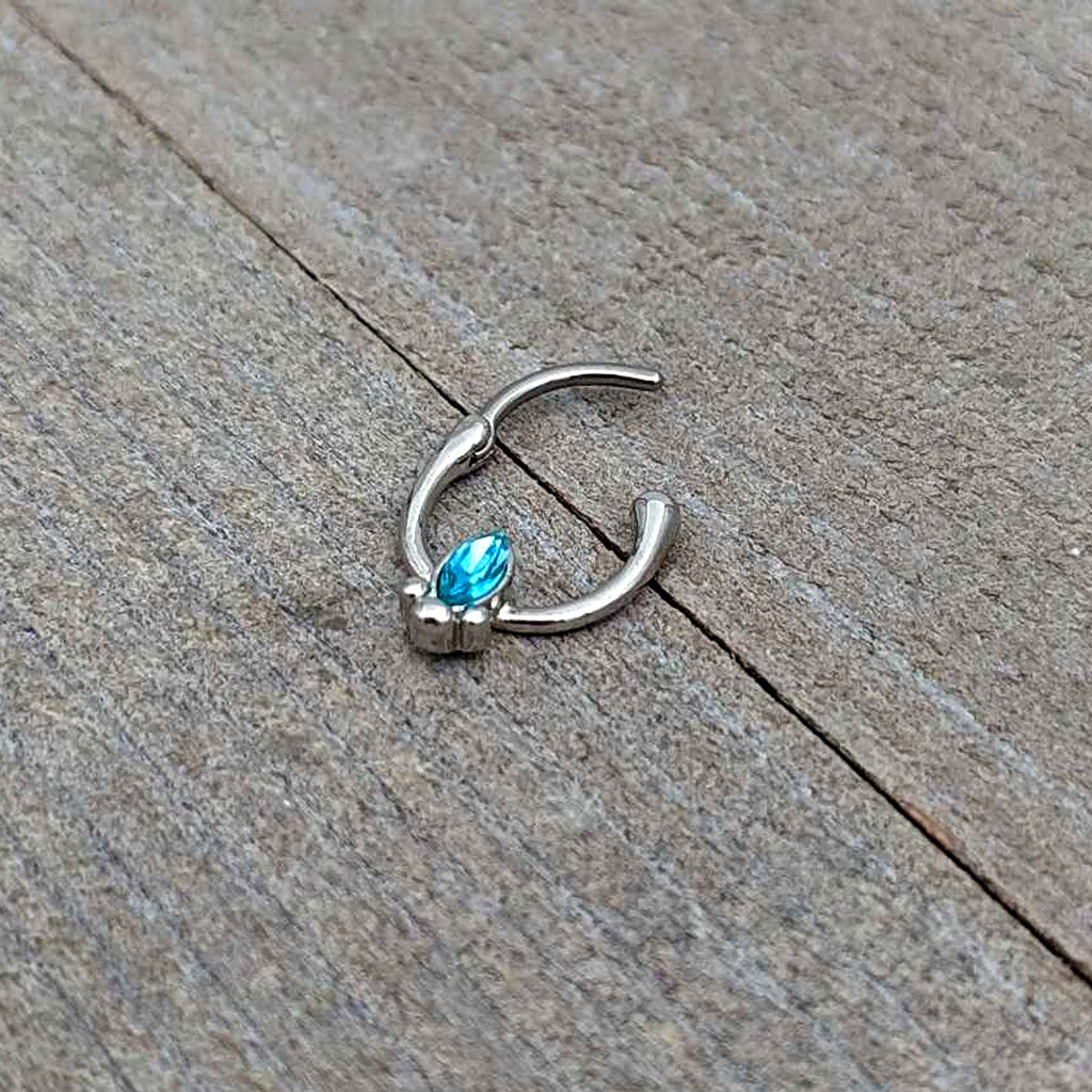 BodyCandy 16G 5/16 Blue Gem Deco Oval Cartilage Clicker — in-use photo