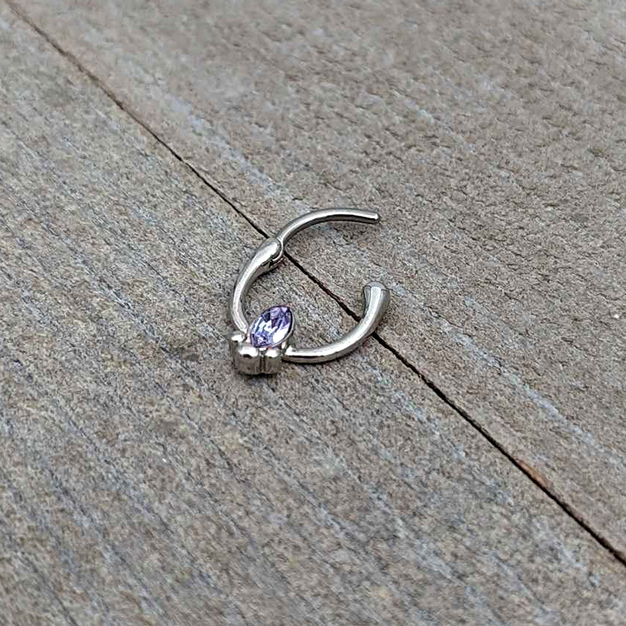 BodyCandy 16G 5/16 Purple Gem Deco Oval Cartilage Clicker — in-use photo