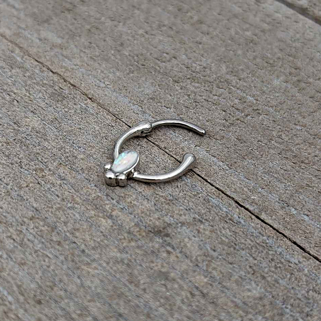 BodyCandy 16G 5/16 White Faux Opal Deco Oval Cartilage Clicker — in-use photo