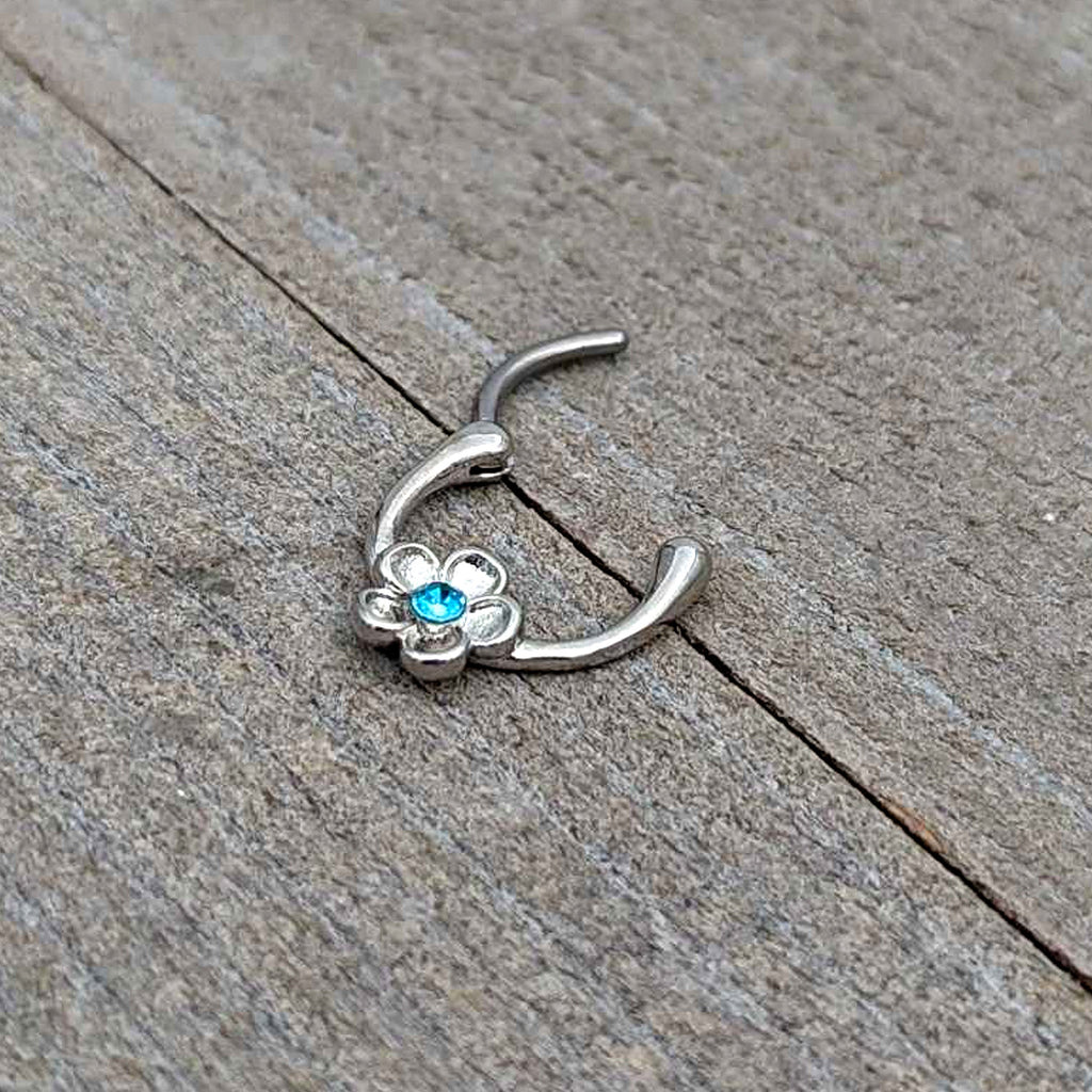 BodyCandy 16G 5/16 Blue Gem Sweetheart Flower Cartilage Clicker — in-use photo
