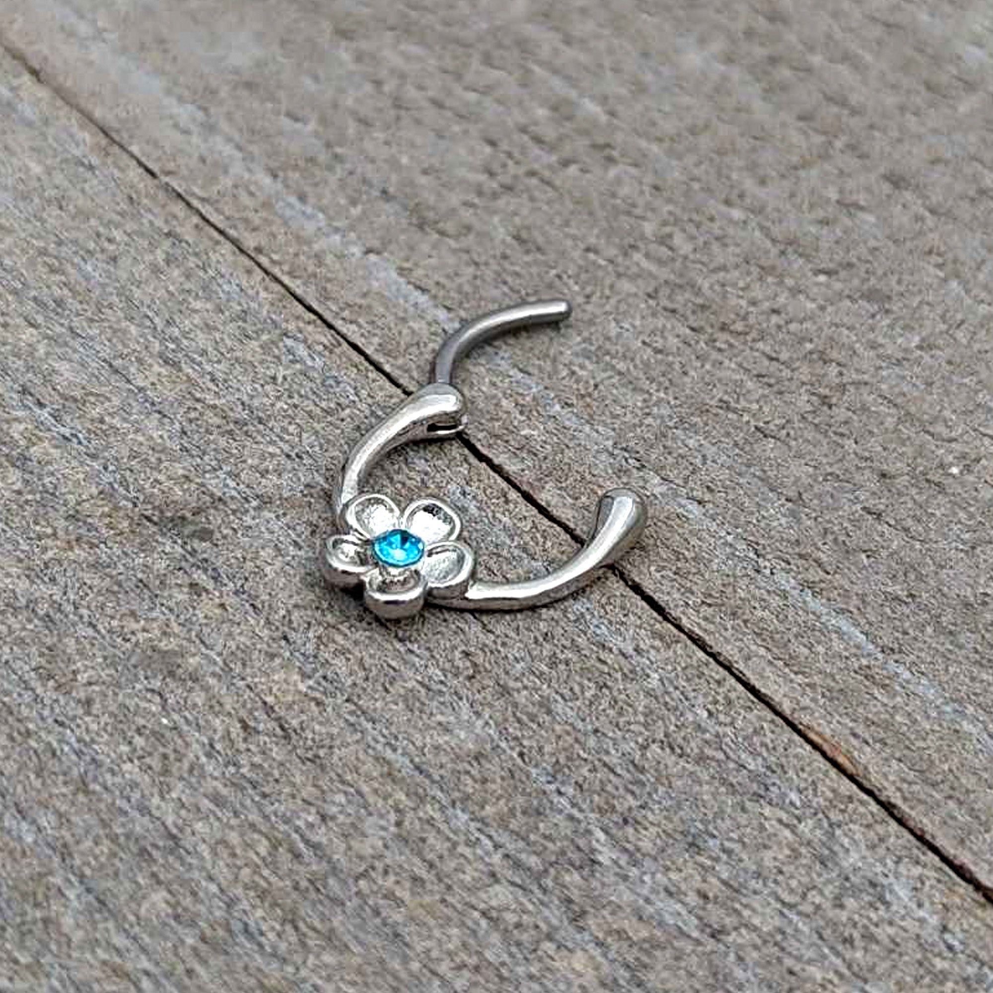 BodyCandy 16G 5/16 Blue Gem Sweetheart Flower Cartilage Clicker — in-use photo