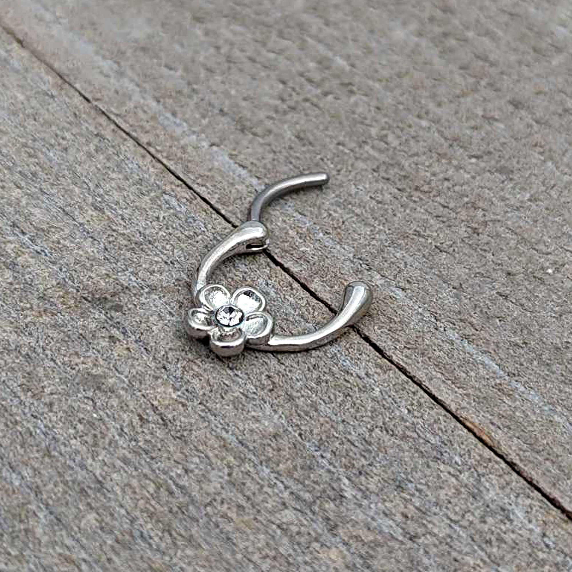 BodyCandy 16G 5/16 Clear Gem Sweetheart Flower Cartilage Clicker — in-use photo
