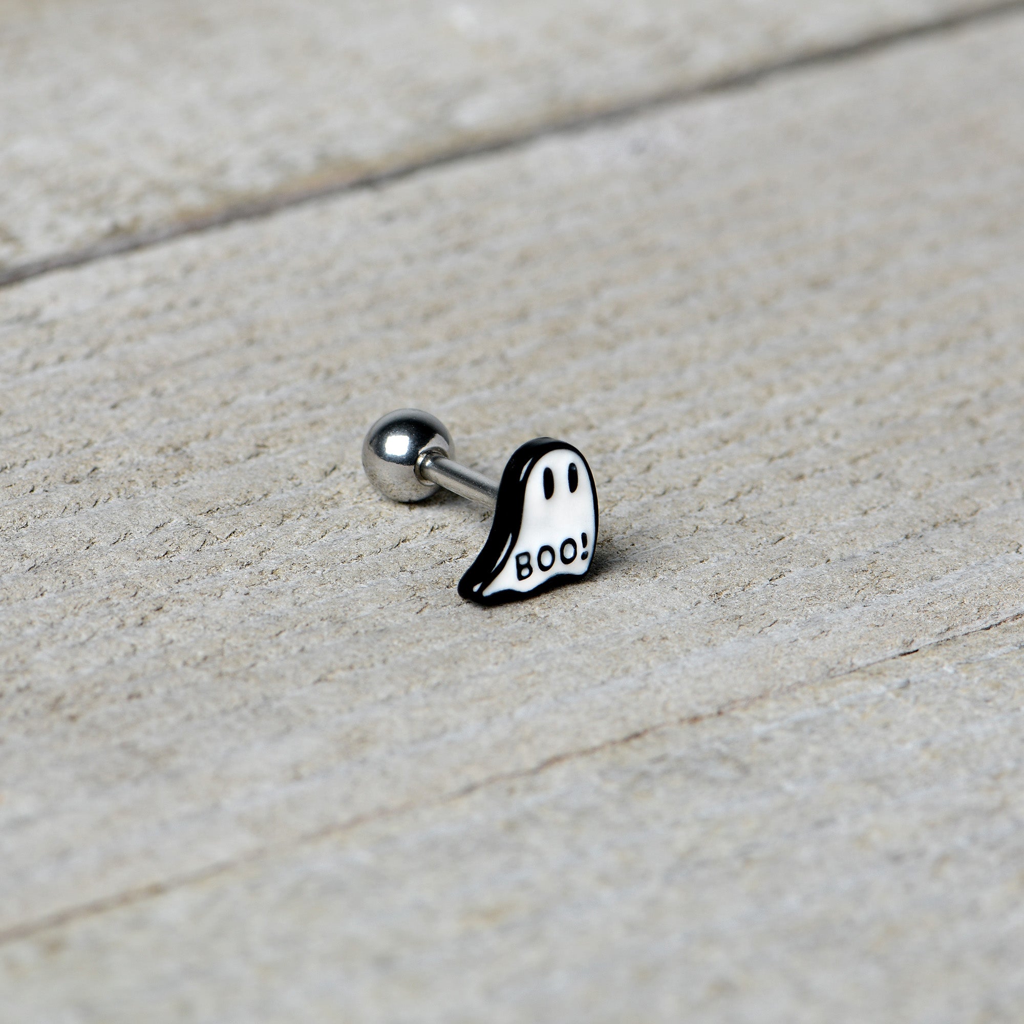 BodyCandy 16G 1/4 White Ghost Glow in the Dark Cartilage Tragus Earring — in-use photo