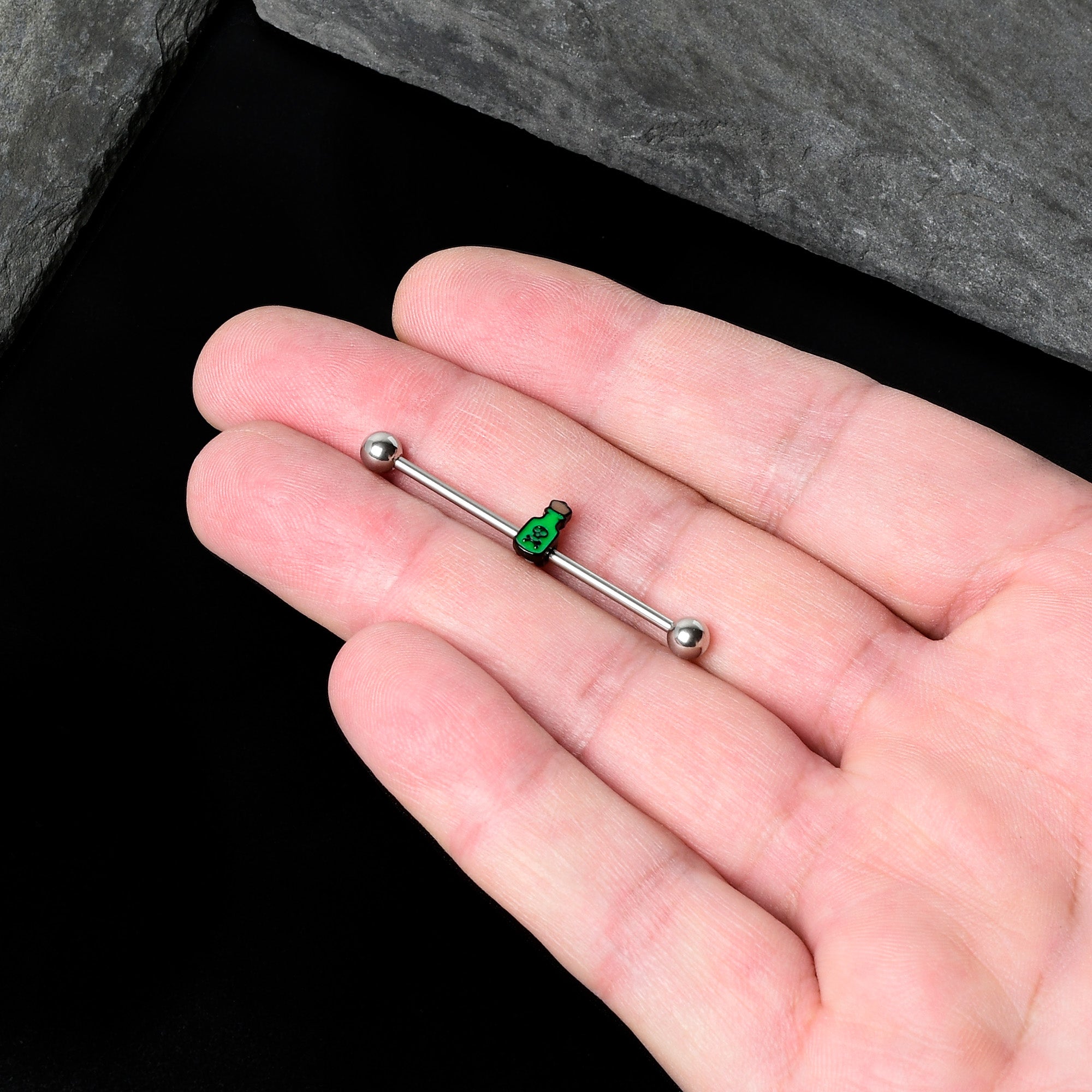 BodyCandy 14G Poison Green Bottle Glow in the Dark Industrial Barbell 38mm — in-use photo