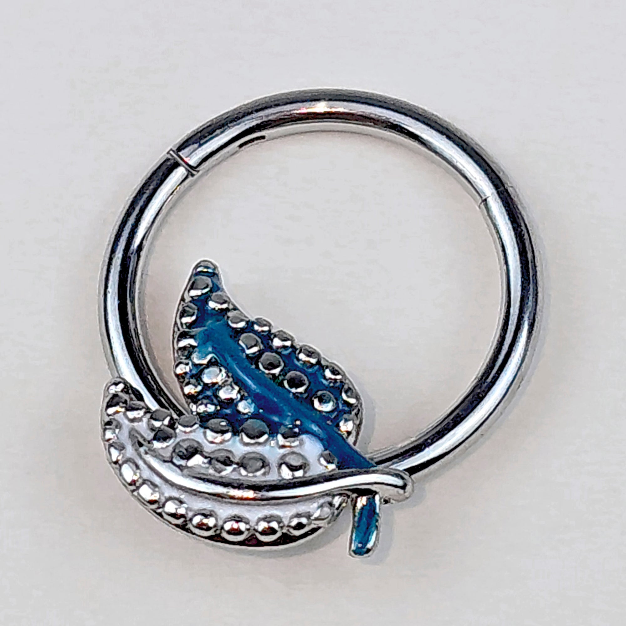 BodyCandy 16G 3/8 Lovely Leaves Blue Hinged Segment Ring — main product shot