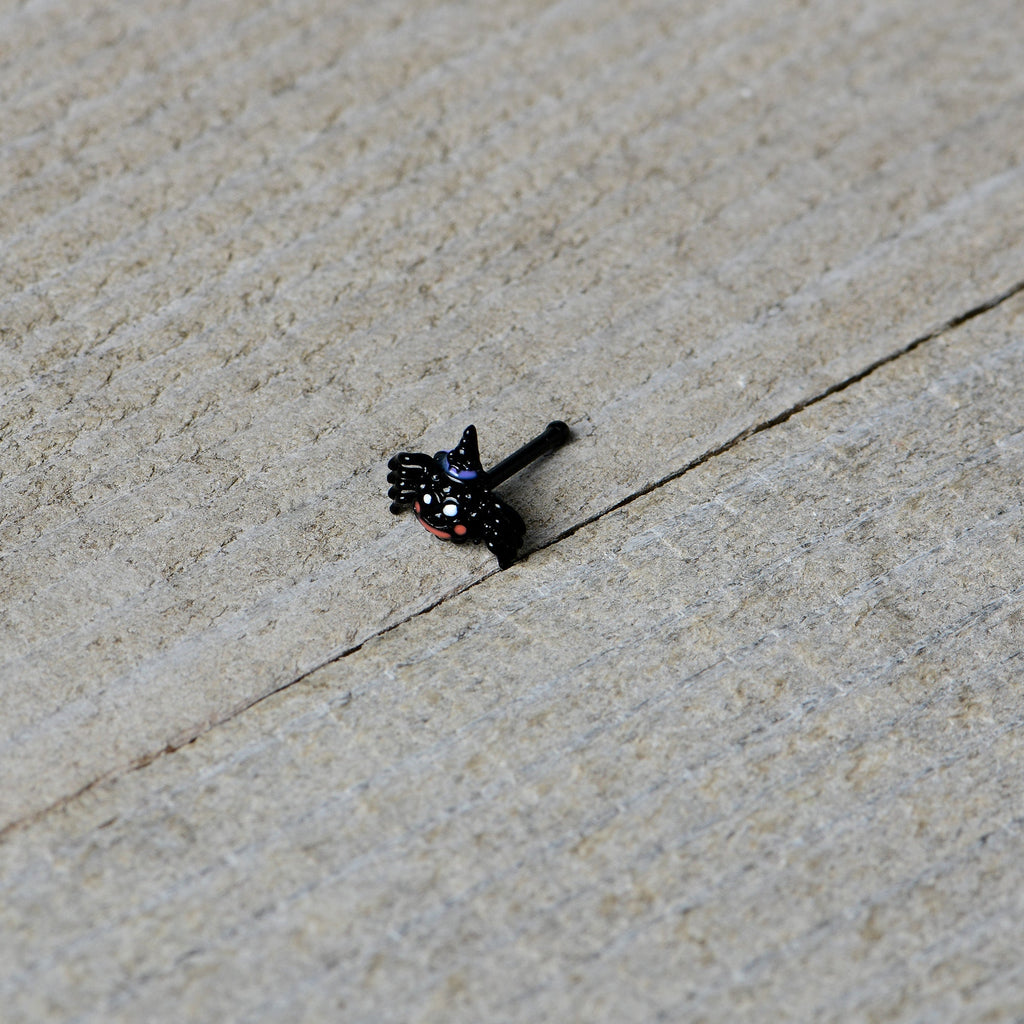 BodyCandy 20G 1/4 Black Halloween Witchy Smiling Spider Nose Bone — in-use photo