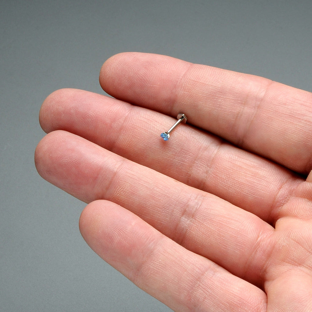 BodyCandy 16G 5/16 Blue CZ Gem ASTM F-136 Implant Grade Titanium Hex End Labret Tragus — in-use photo