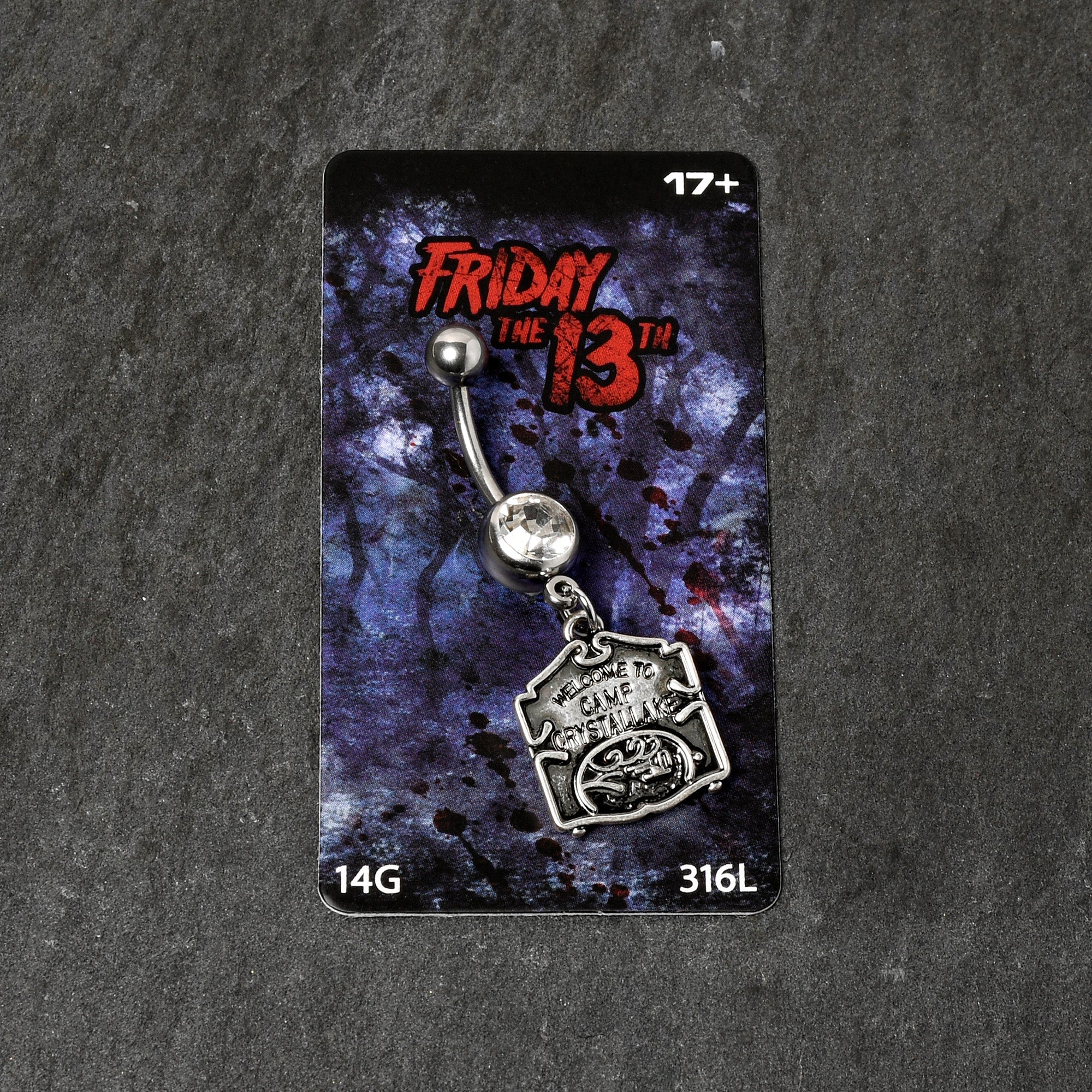 BodyCandy Officially Licensed Friday the 13th Clear Gem Camp Sign Dangle Belly Ring — in-use photo