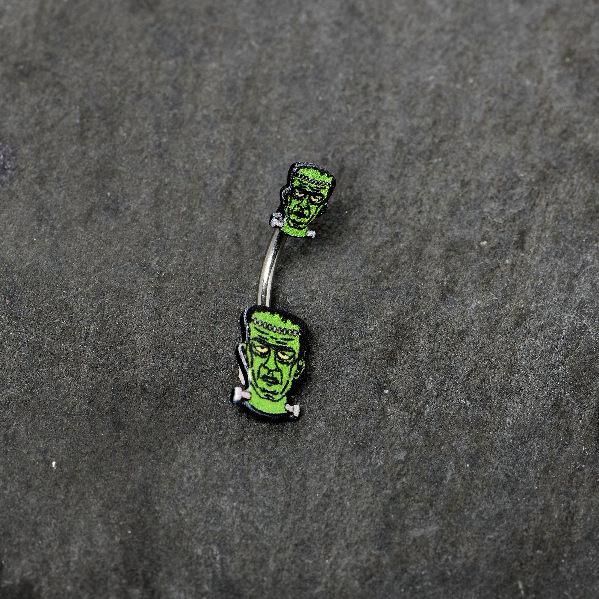 BodyCandy Frankenstein Head Green Glow in the Dark Double Mount Belly Ring — back view