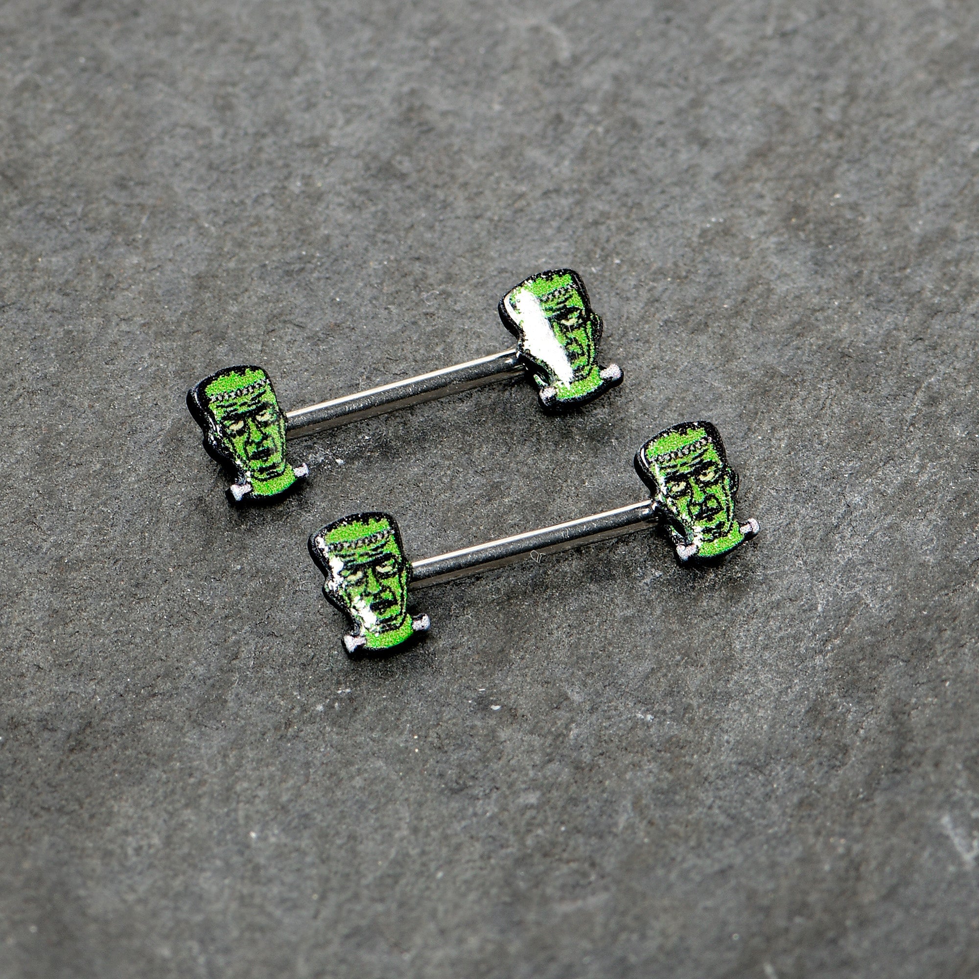 BodyCandy 14G 9/16 Frankenstein Head Green Glow in the Dark Nipple Ring Set — back view