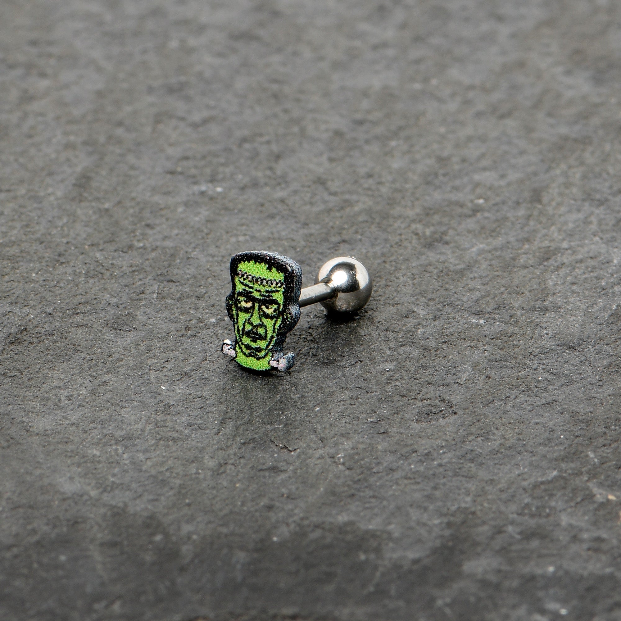 BodyCandy 16G 1/4 Frankenstein Head Green Glow in the Dark Cartilage Earring — alternative angle