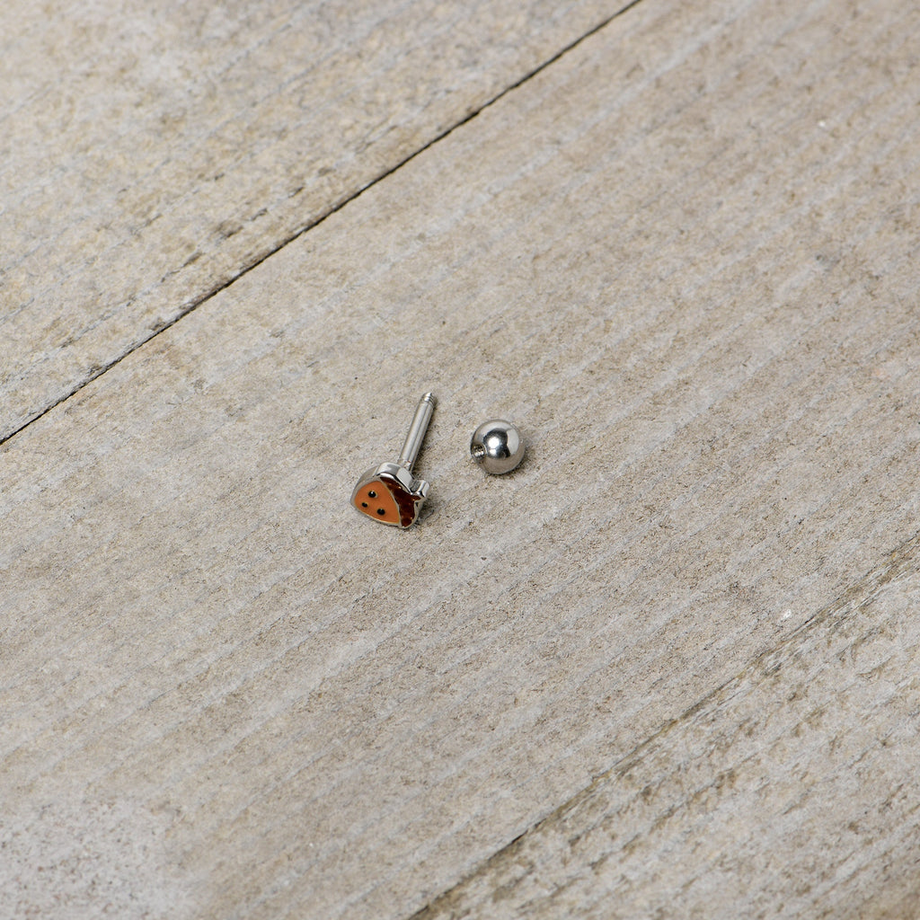 BodyCandy 16G 5/16 Acorn Face Brown Autumn Cartilage Tragus Earring — in-use photo