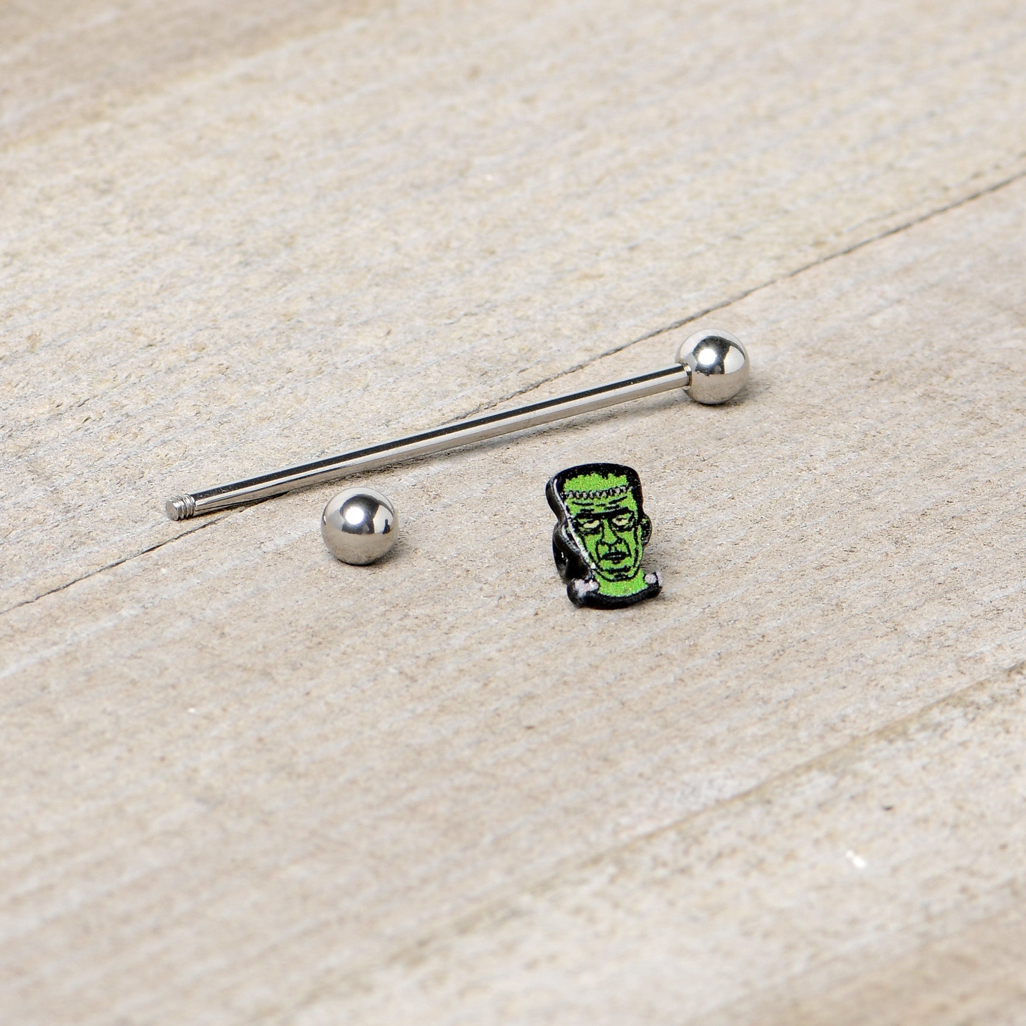 BodyCandy 14G Frankenstein Head Green Glow in Dark Industrial Barbell 38mm — alternative angle
